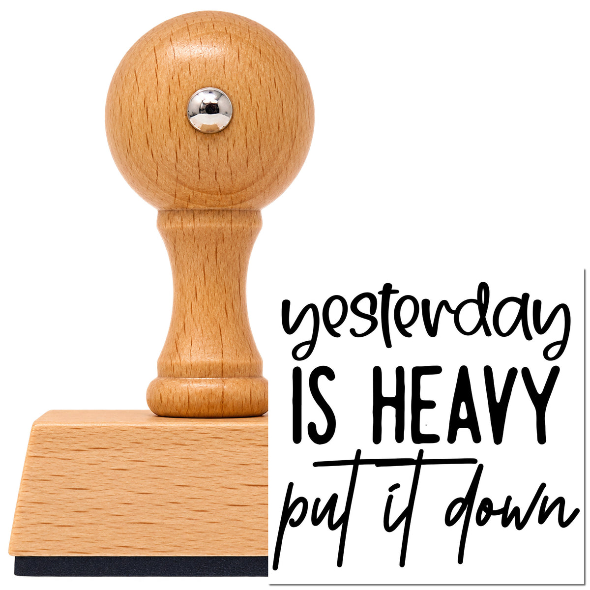 Vintage Pro beech wood stamp with a round knob handle, shown with its black Yesterday Is Heavy Put It Down imprint on white.