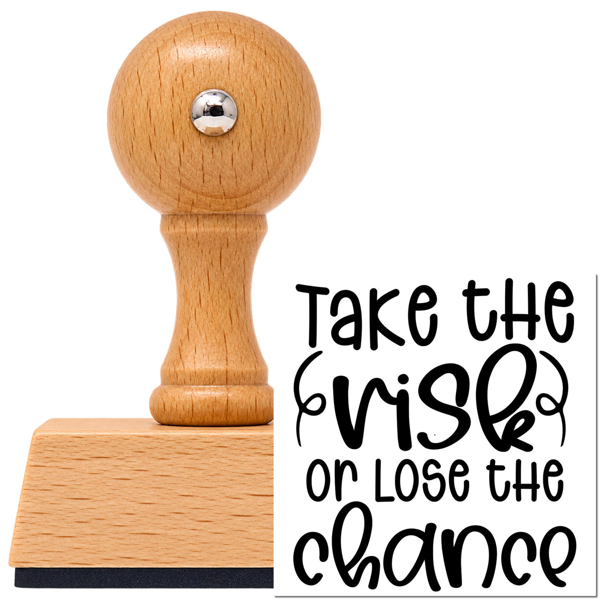 Vintage Pro beech wood stamp with a round knob handle, shown with its black Take The Risk Or Lose The Chance imprint on white.