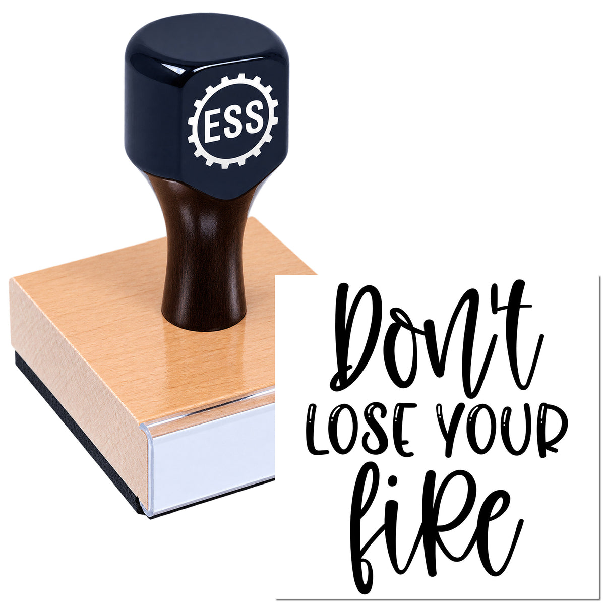 Custom navy ESS stamp and seal on a wooden block beside black script reading "Don't lose your fire."
