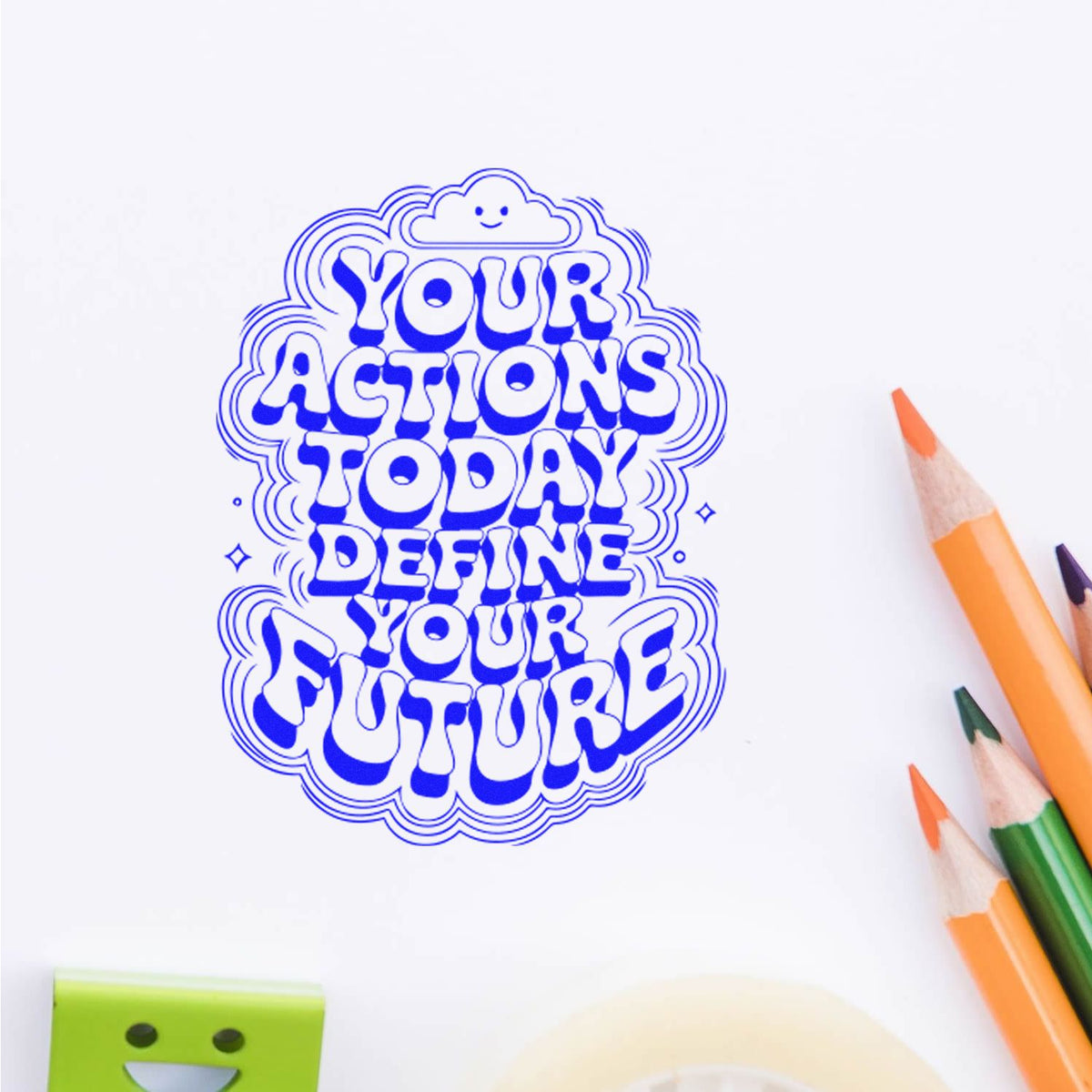 Blue stamp seal with slogan Your Actions Today Define Your Future on white paper, beside colored pencils.