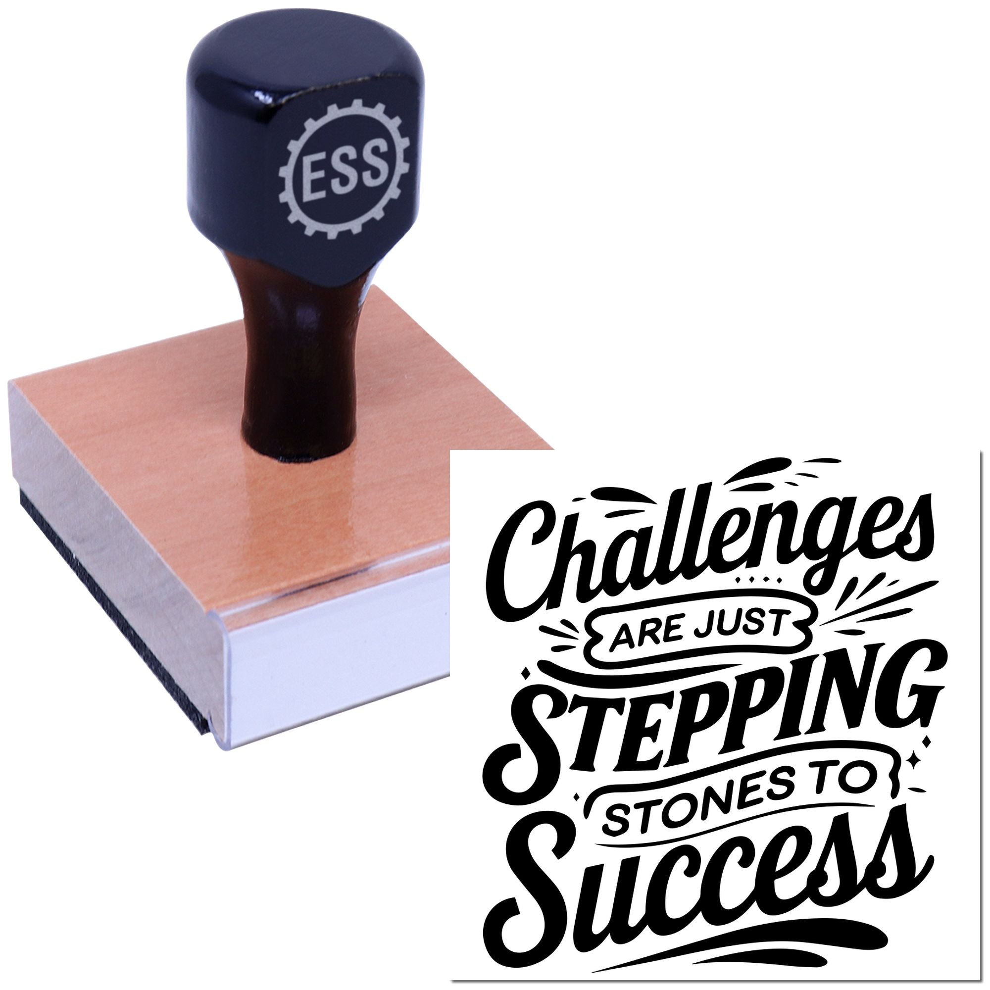 Dark navy rubber stamp on a wooden base with ESS logo and black Challenges are just stepping stones to success seal graphic.