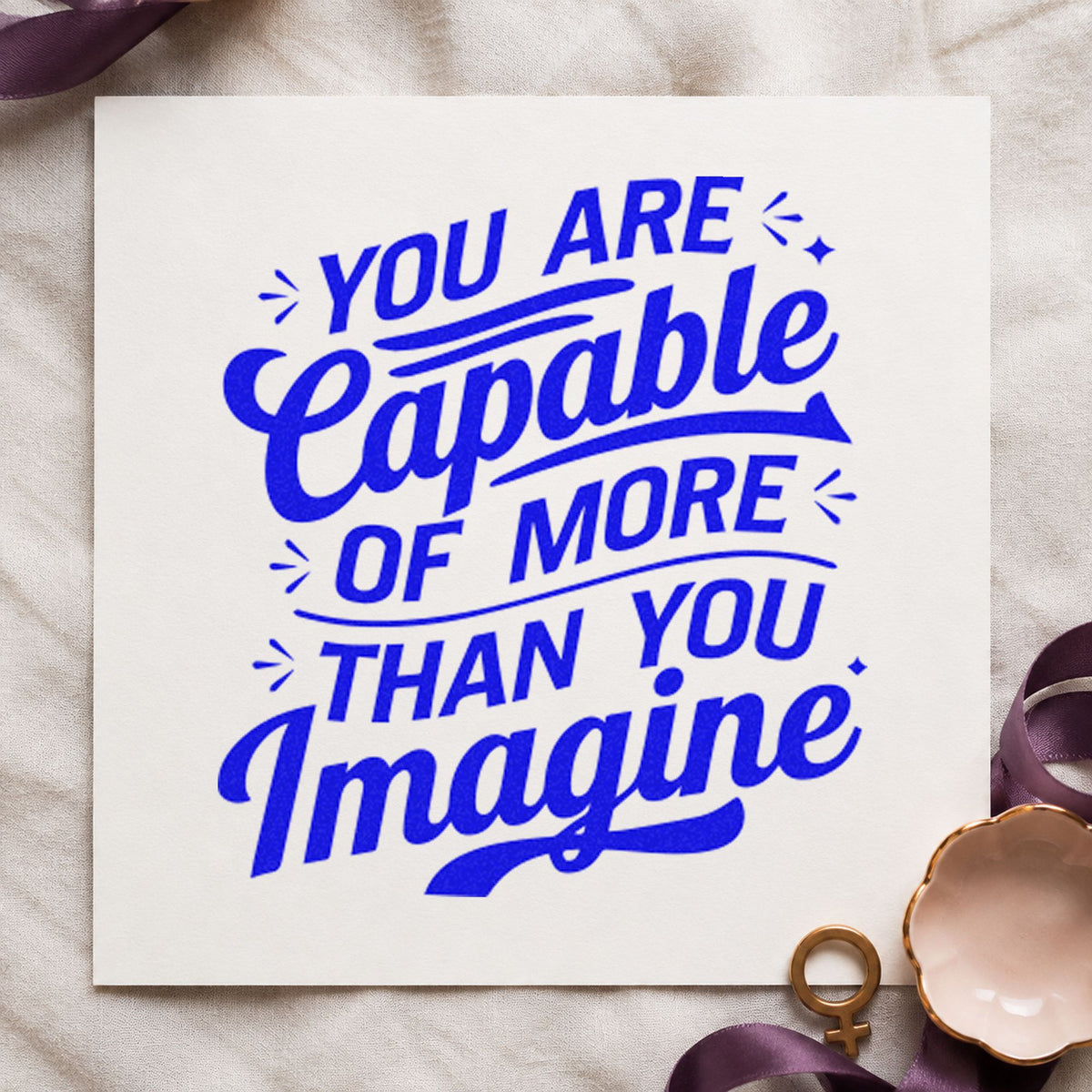 More Capable Than Imagine craft stamp in blue ink on cardstock, an easy option for duty bag printing.
