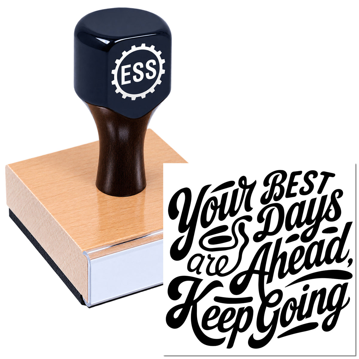 Blue rubber stamp and seal on wood block with bold black "Your best days are ahead, keep going" design.