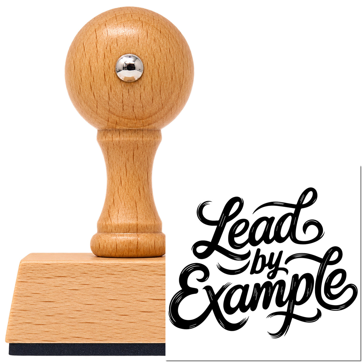 Vintage Pro beech wood stamp with a round knob handle, shown with its black Lead By Example imprint on white.