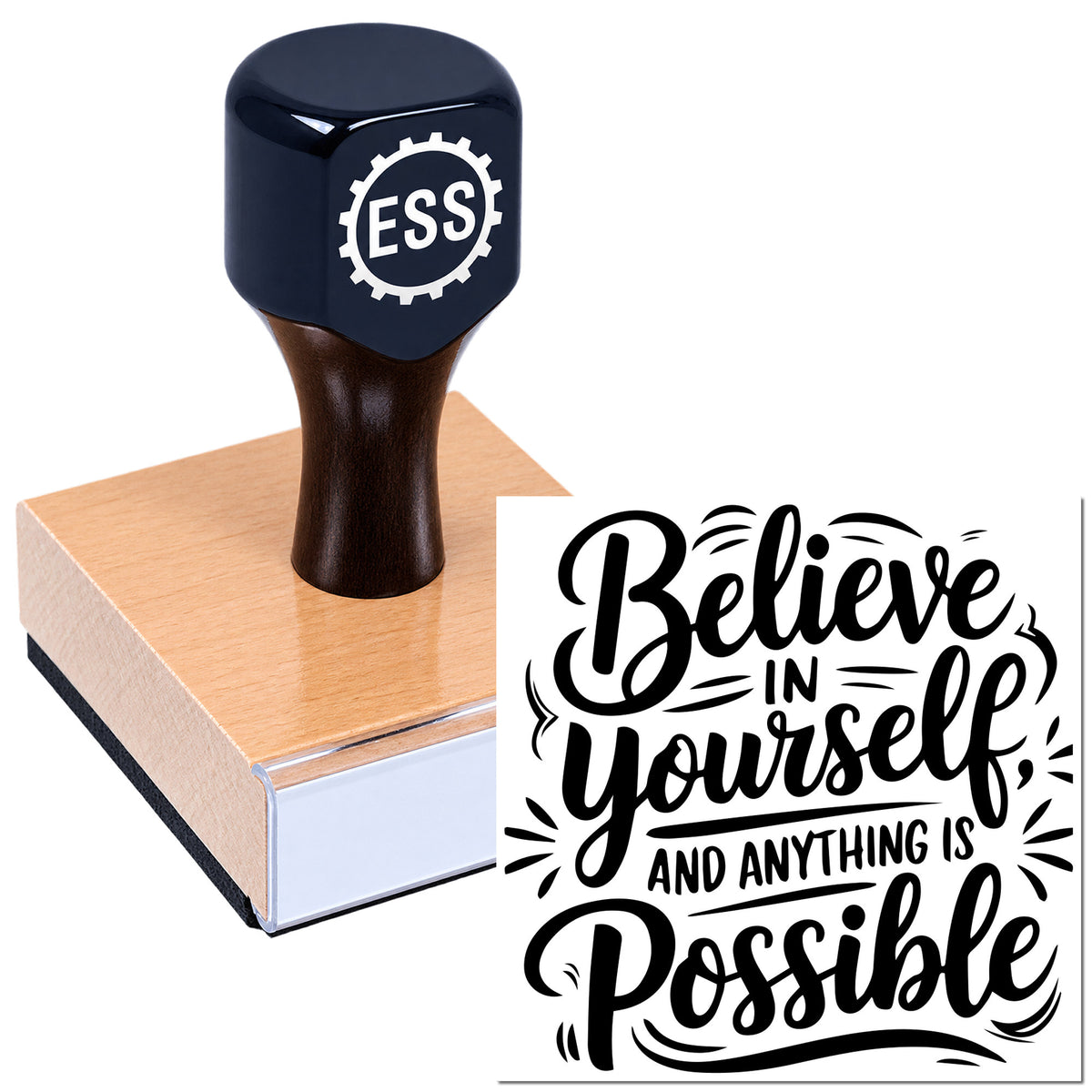 Black ESS rubber seal stamp on a wooden block beside a white quote print reading "Believe in yourself, and anything is possible."