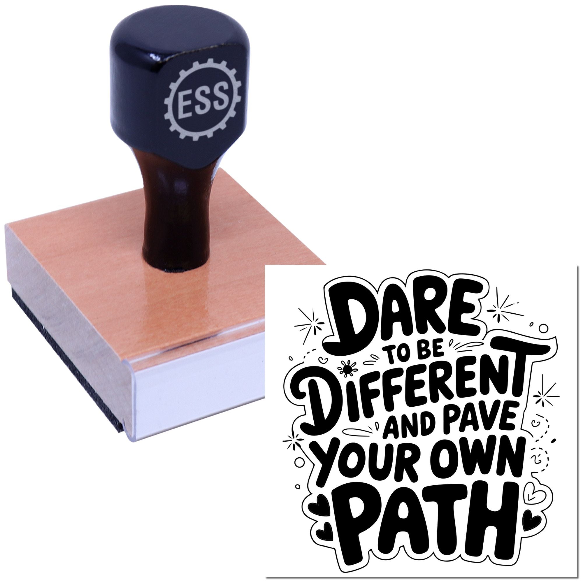 Dark blue ESS rubber stamp seal on wooden block with bold black Dare to be different and pave your own path imprint.