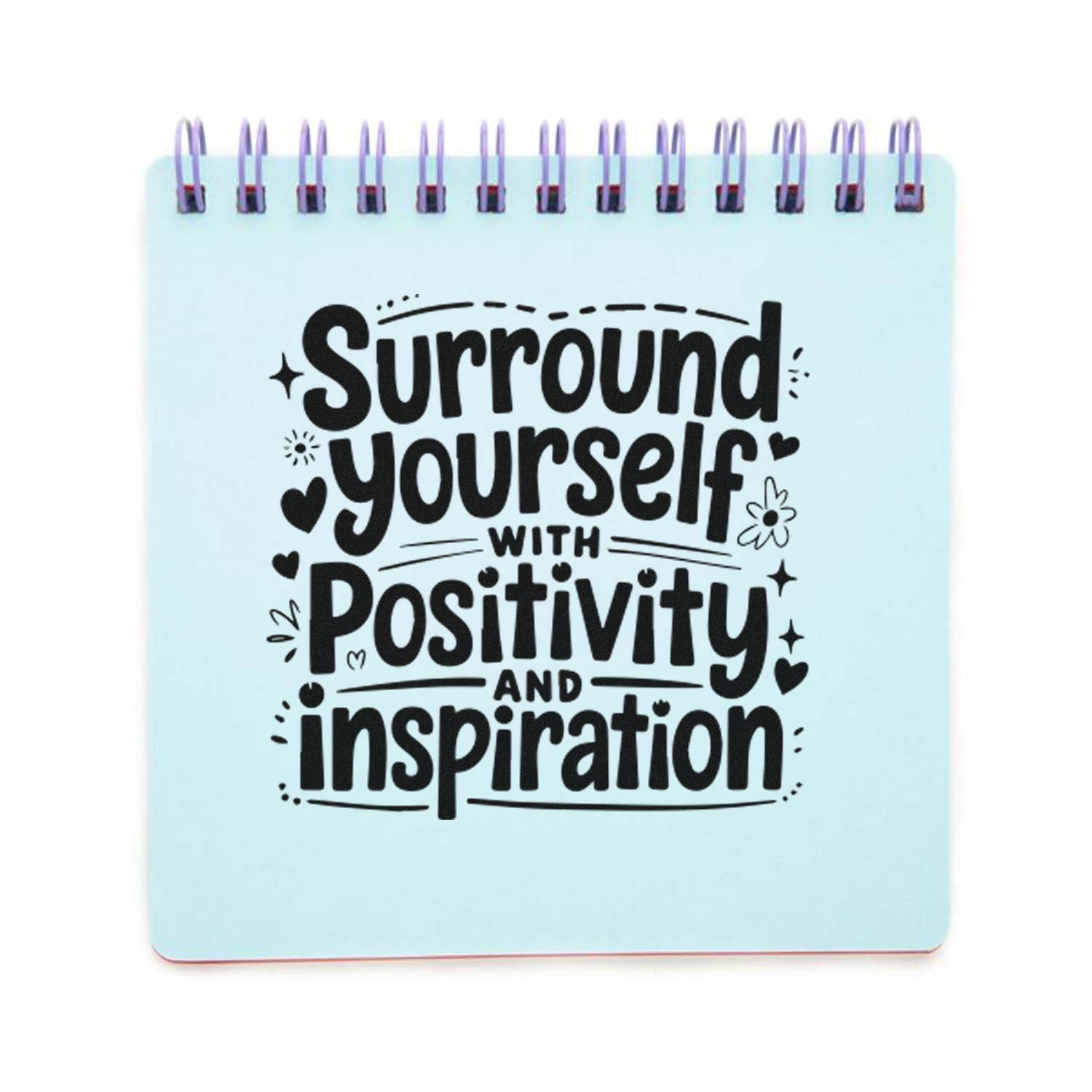 Light blue spiral-bound stamp seal with black Surround yourself with positivity and inspiration text and doodle hearts