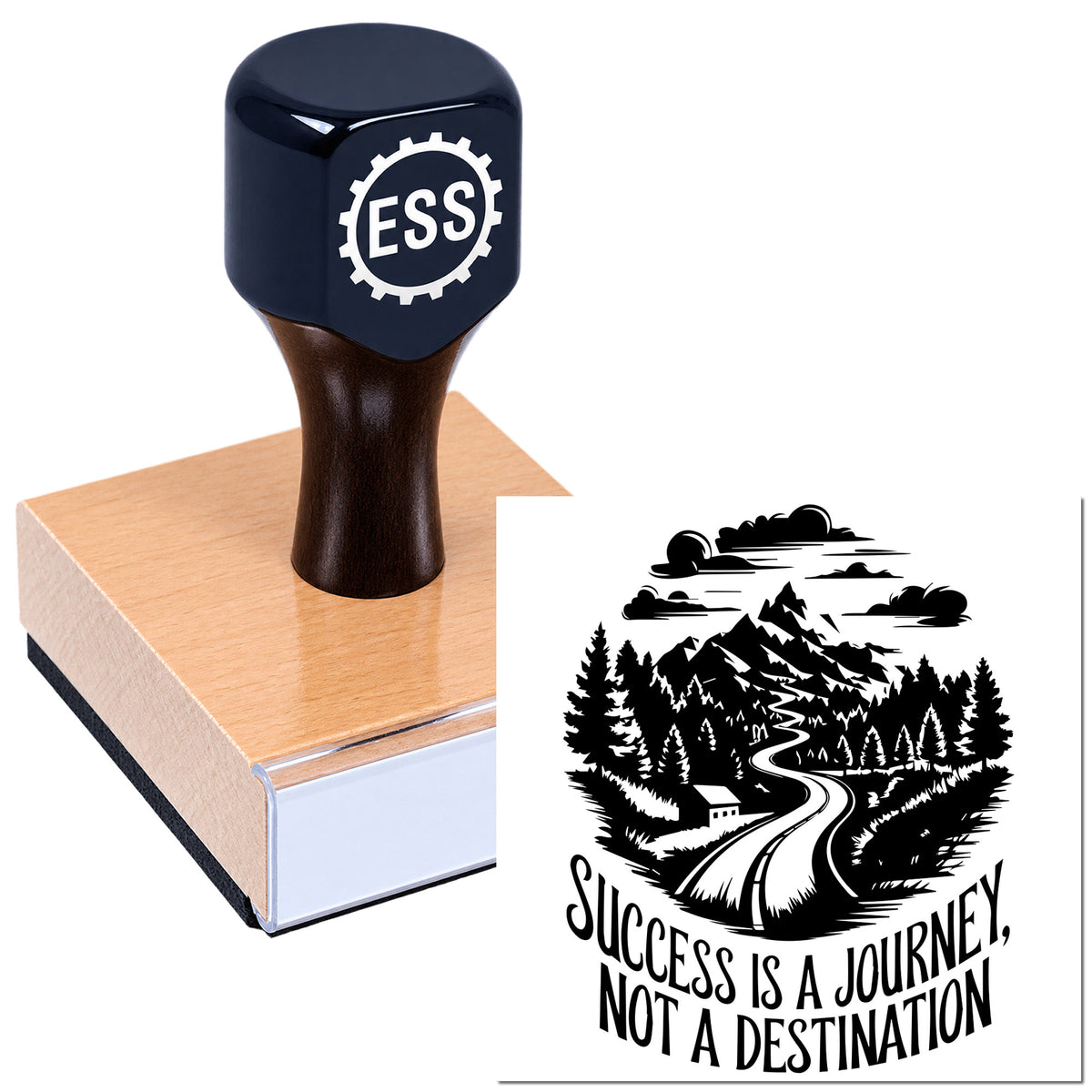 Dark blue ESS rubber stamp on wooden block with black mountain-road seal design and "Success is a journey" text.