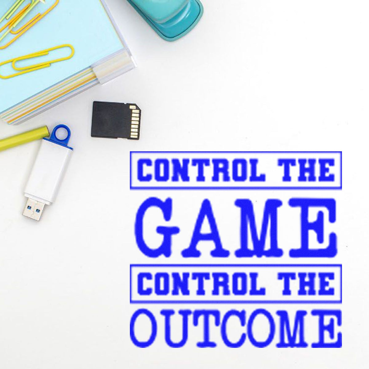 Blue rubber stamp and seal reading CONTROL THE GAME, CONTROL THE OUTCOME, with USB drive, memory card, and paper clips.