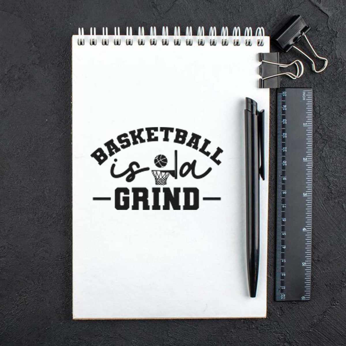 Basketball Is A Grind Premium Wood-Mounted Stamp - Vintage Pro imprint stamped in black ink. BASKETBALL is a GRIND appears with a small basketball hoop and horizontal rules.