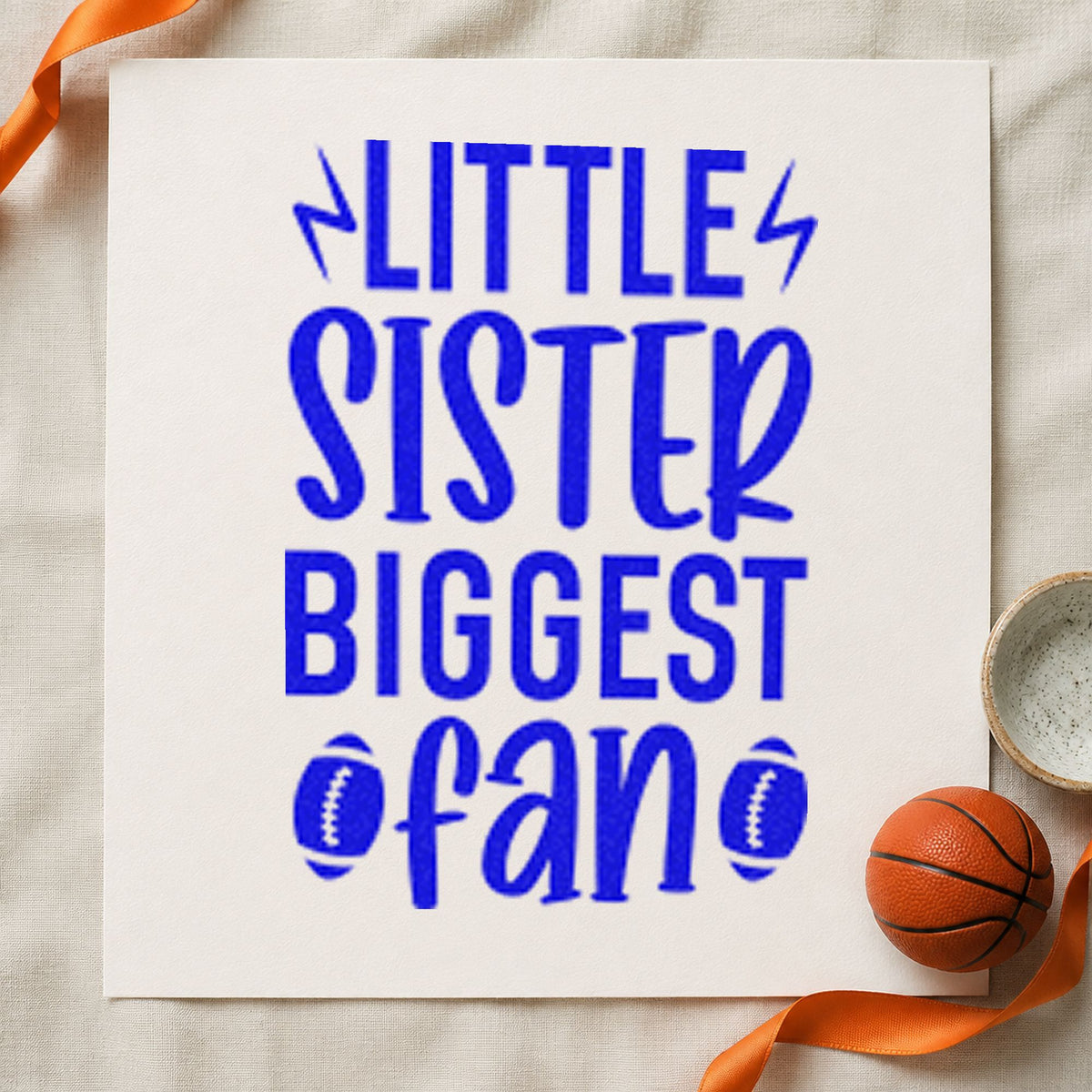 Little Sister Biggest Fan craft stamp in blue ink on cardstock, an easy option for stadium blanket printing.
