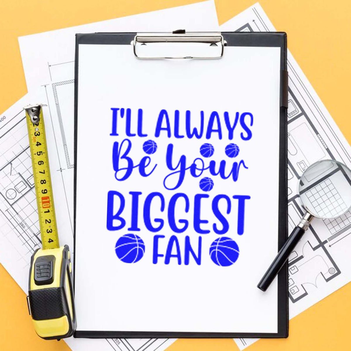 Blue basketball-themed stamp and seal reading Ill always be your biggest fan on a clipboard, with tape measure and magnifier.
