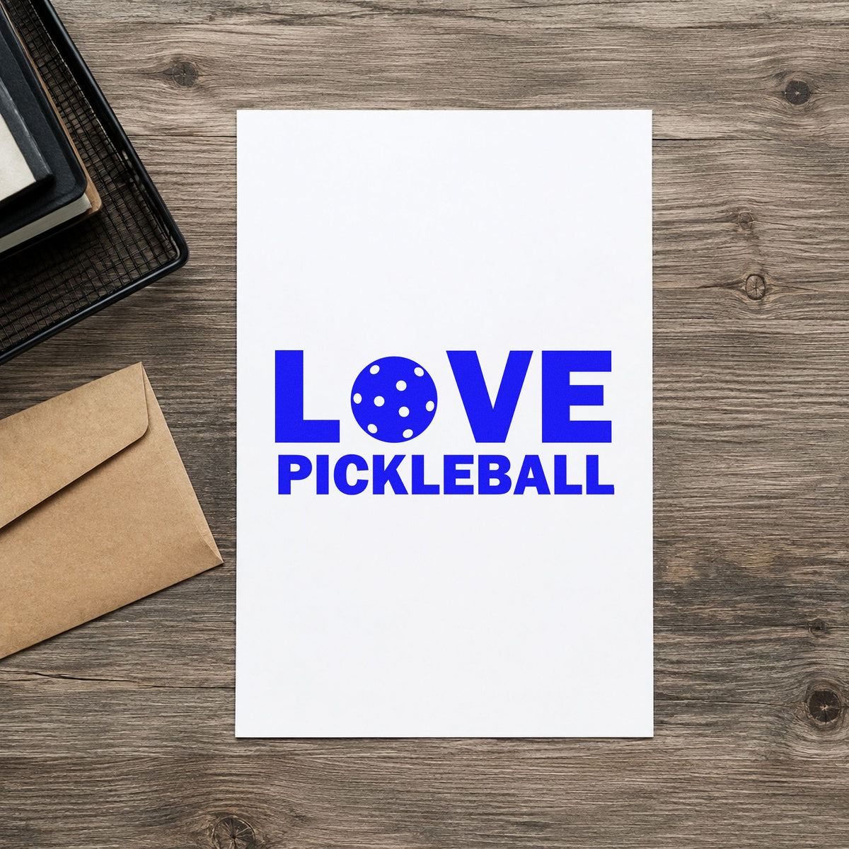 Love Pickleball Ball Letter craft stamp in blue ink on cardstock, an easy option for score flip printing.
