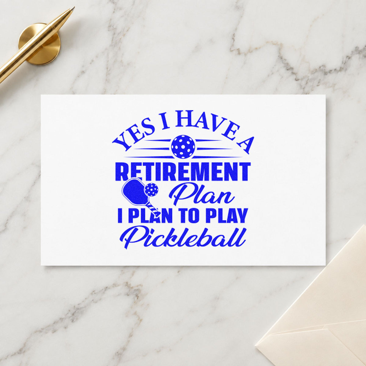 Retirement Plan Play Pickleball craft stamp in blue ink on cardstock, an easy option for party banner printing.