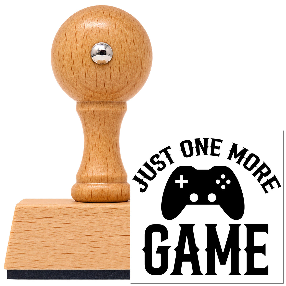 Vintage Pro beech wood stamp with a round knob handle, shown with its black One More Game Controller Lettering imprint on white.