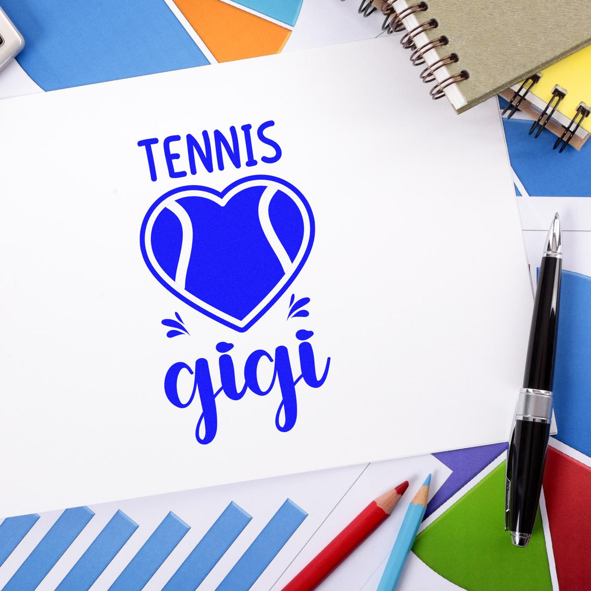 Blue tennis-themed custom stamp and seal with heart tennis ball and TENNIS gigi on white paper, surrounded by colorful stationery.