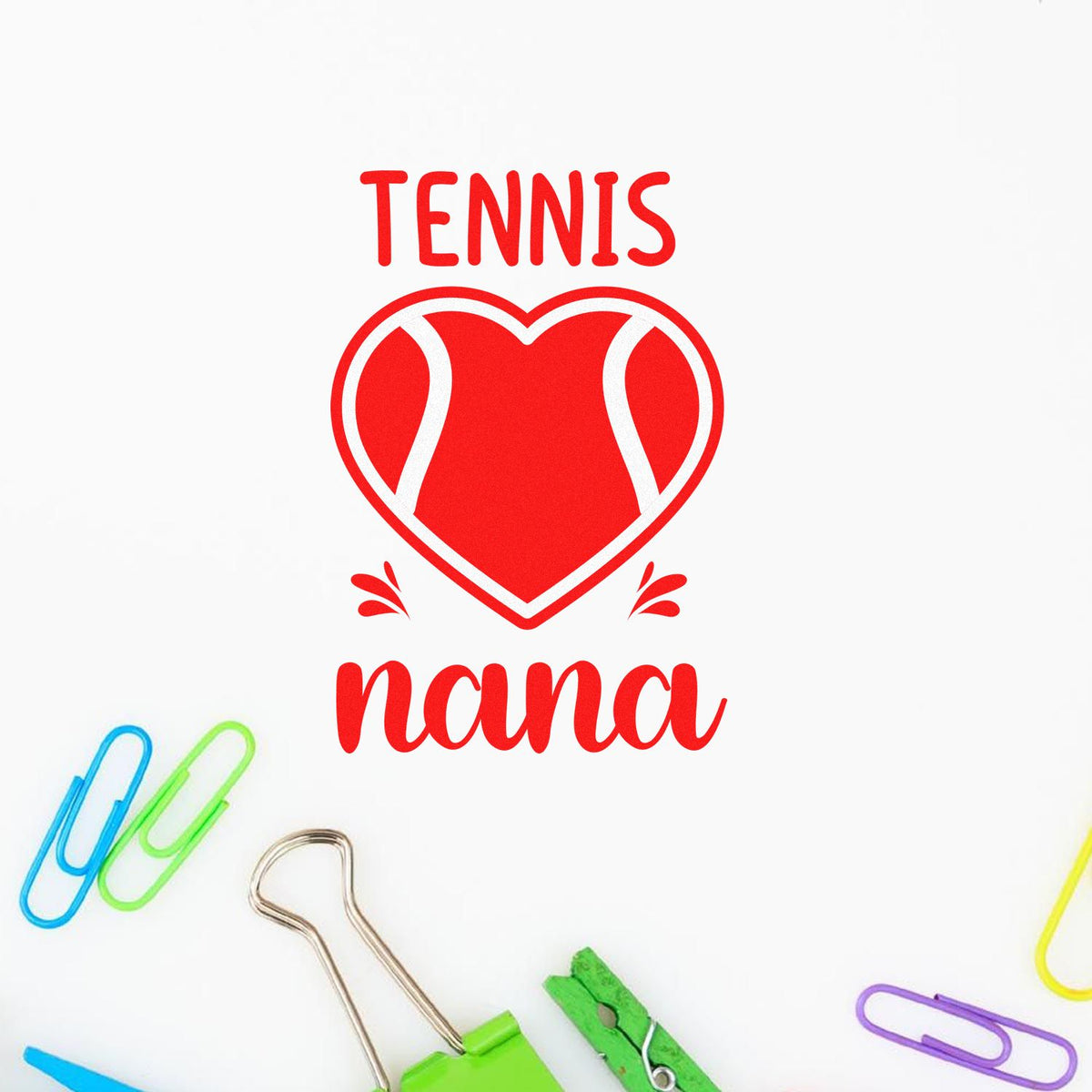 Red tennis stamp seal with heart-shaped tennis ball and nana on white, accented by colorful paper clips.