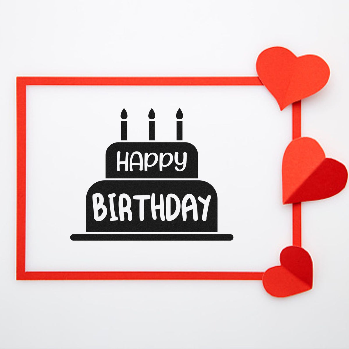 Black Happy Birthday cake stamp with red heart seal border on white background