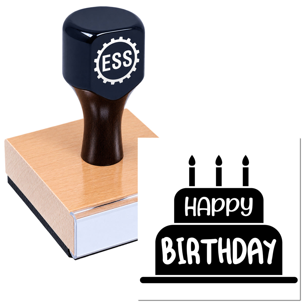 Black stamp and seal on a wooden block, with ESS logo and Happy Birthday cake design.