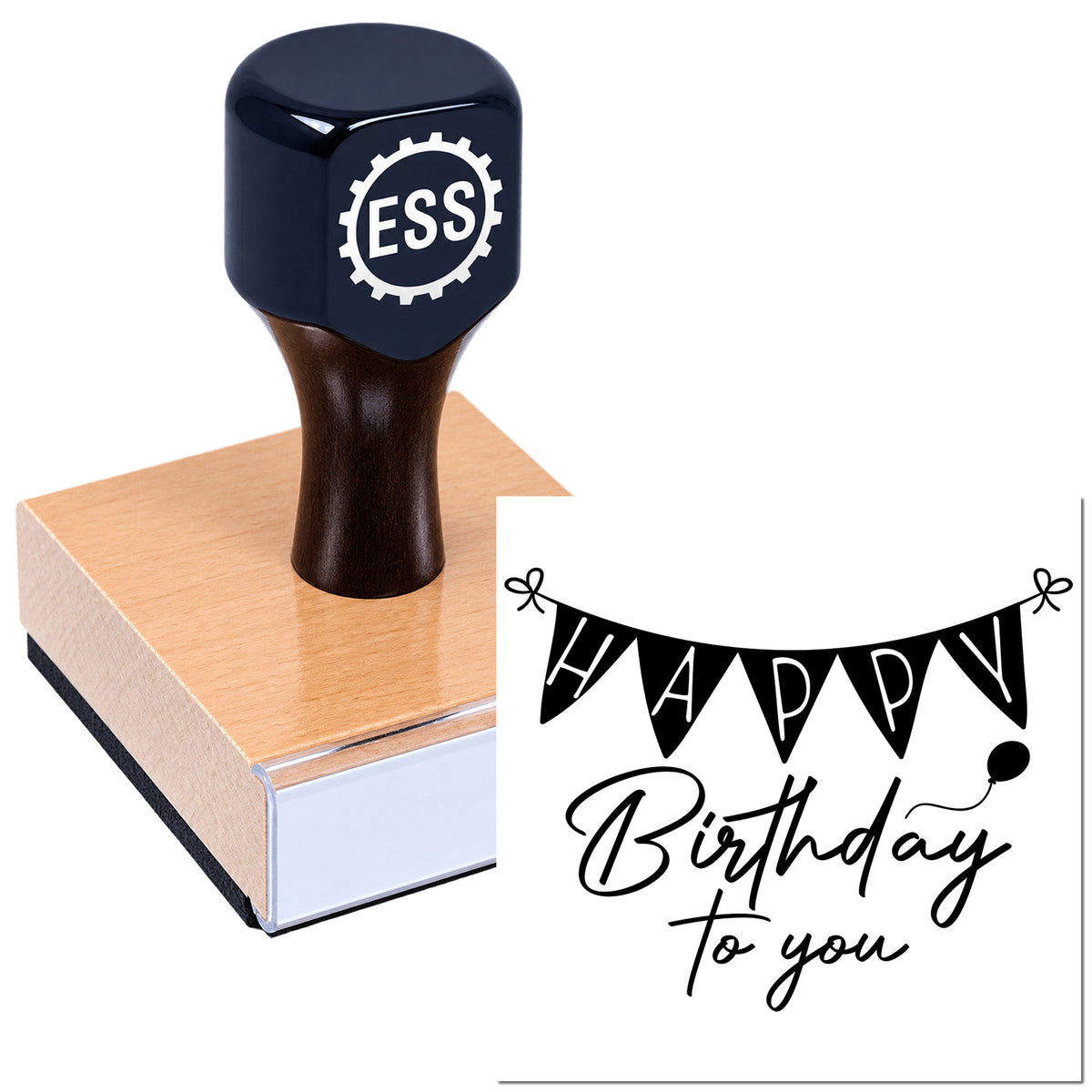 Dark blue ESS rubber stamp on a brown wooden block with black-and-white Happy Birthday to you seal design