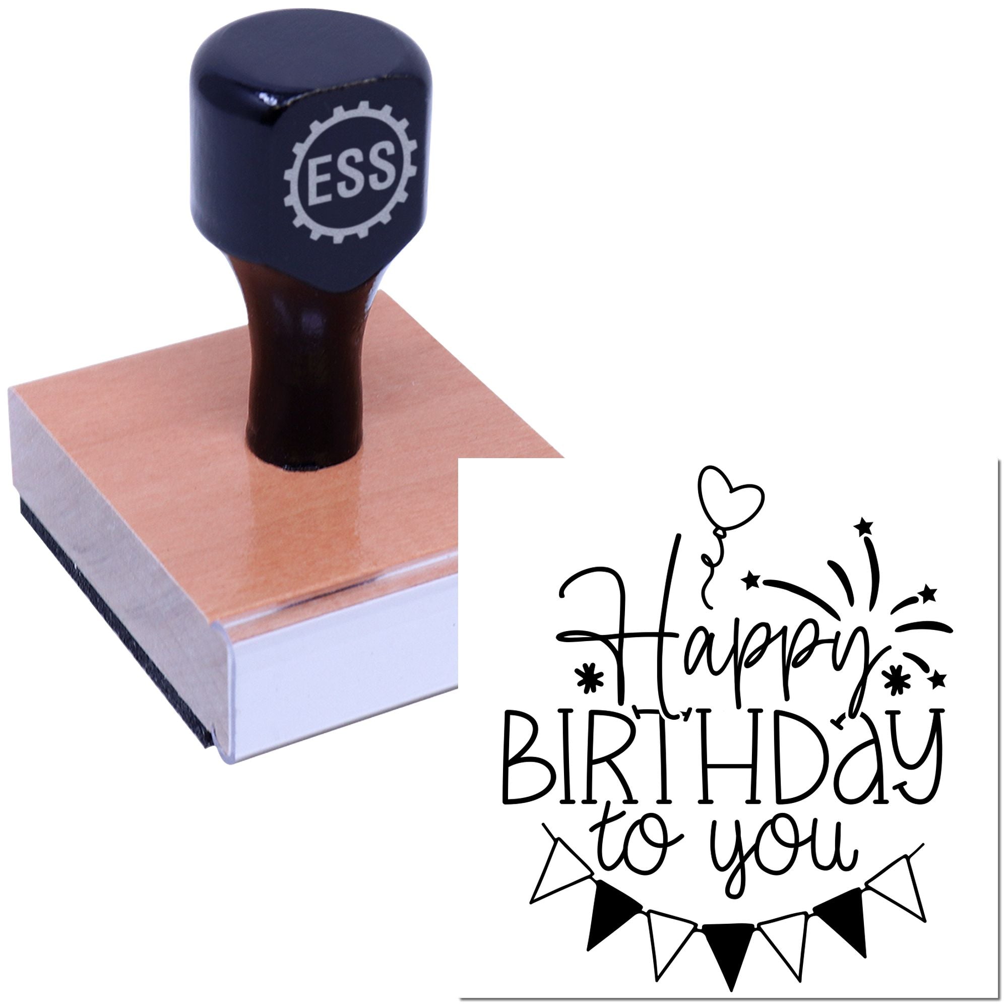 Navy ESS rubber stamp on wooden block next to black Happy Birthday to you seal design