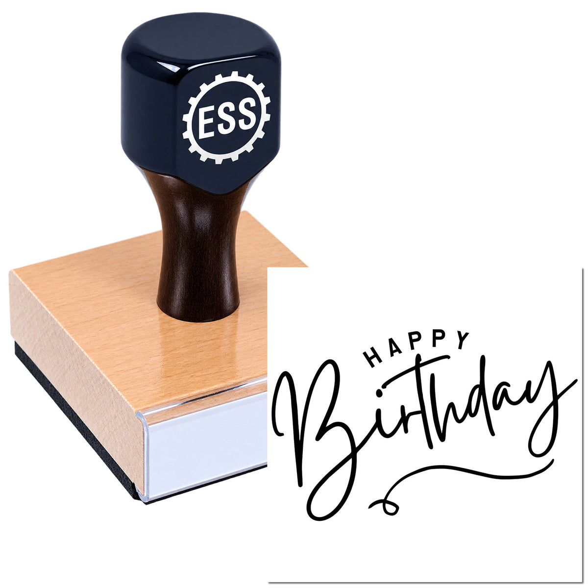 Dark navy ESS rubber stamp on wood block beside black "Happy Birthday" seal impression on white paper