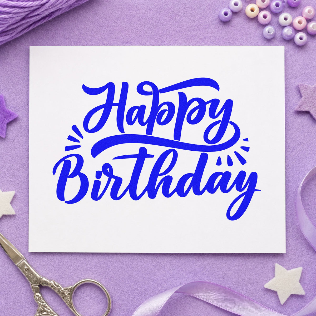 Happy Birthday Retro Flourishes craft stamp in blue ink on cardstock, an easy option for rink banner printing.