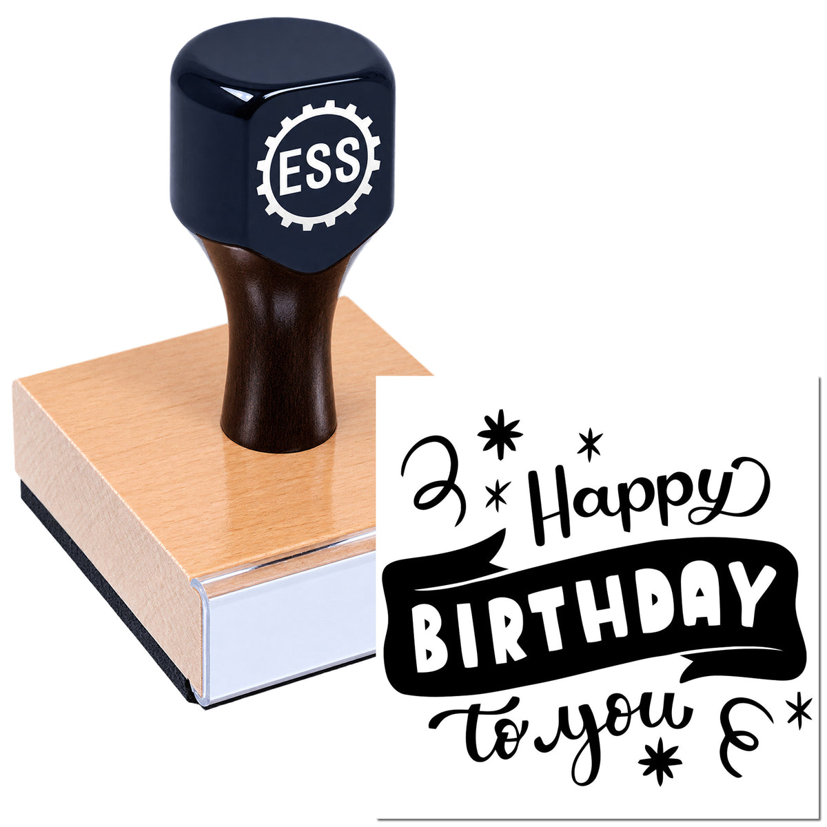 Black ESS rubber stamp on a wooden block, stamping "Happy Birthday to you" in bold black script.