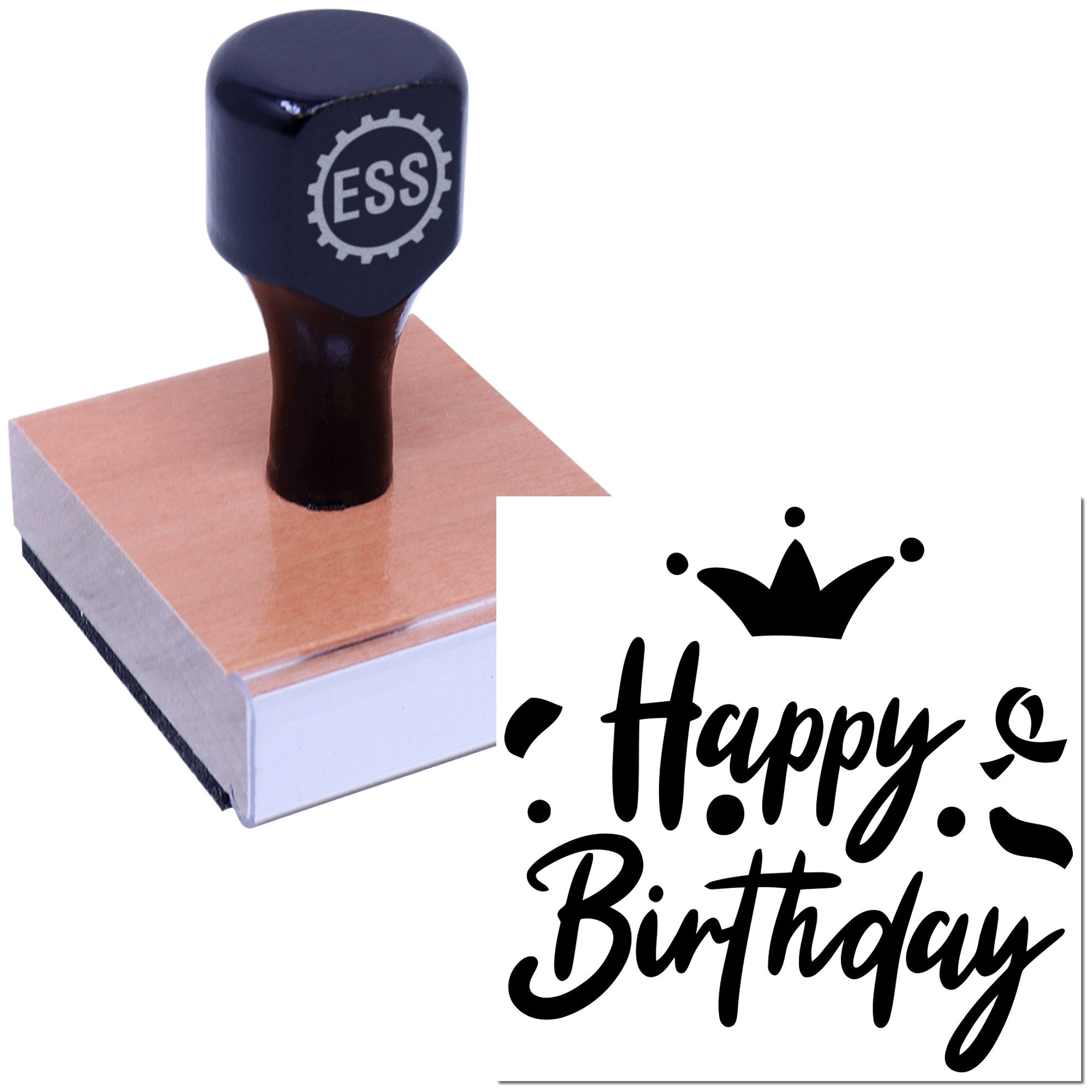 Black ESS rubber stamp pressing a wooden block, with Happy Birthday seal design in bold black script.