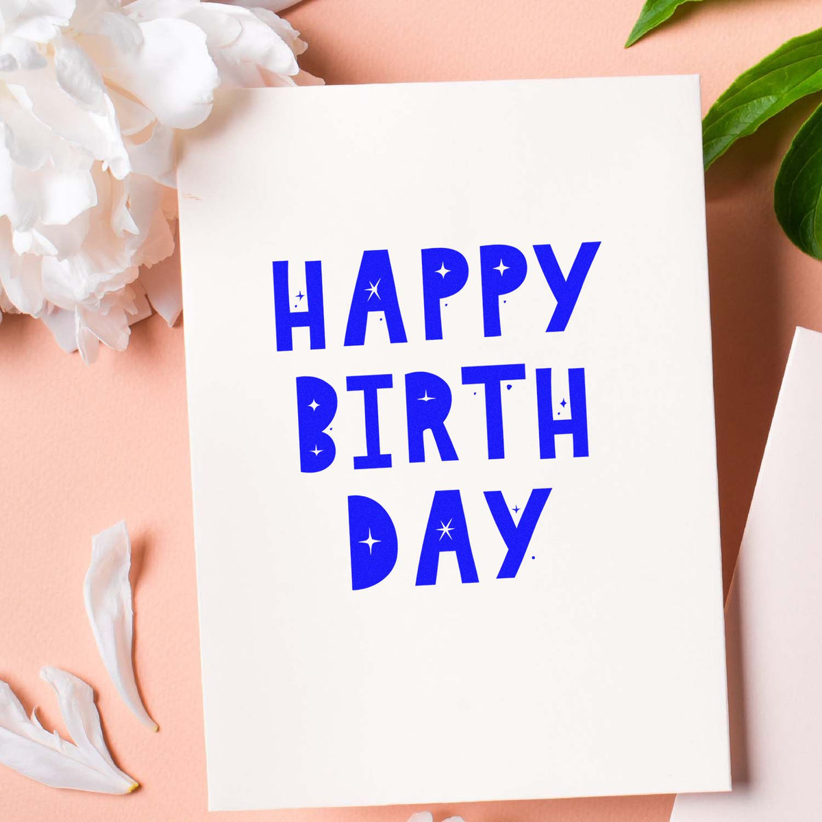 Blue stamped HAPPY BIRTH DAY greeting card with star accents on white, styled as a stamp and seal product.