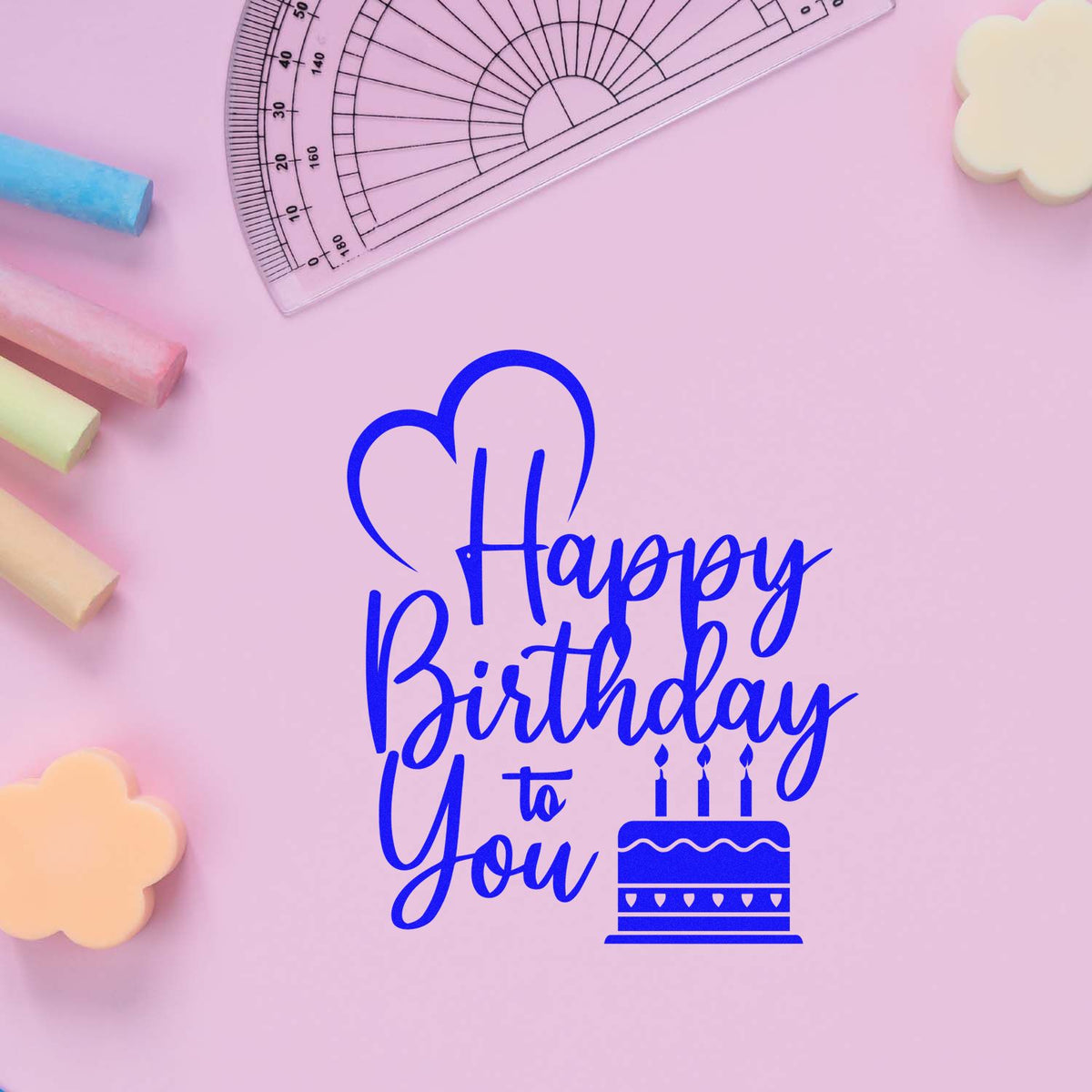 Blue Happy Birthday to You stamp and seal design with cake and heart on pastel pink background.