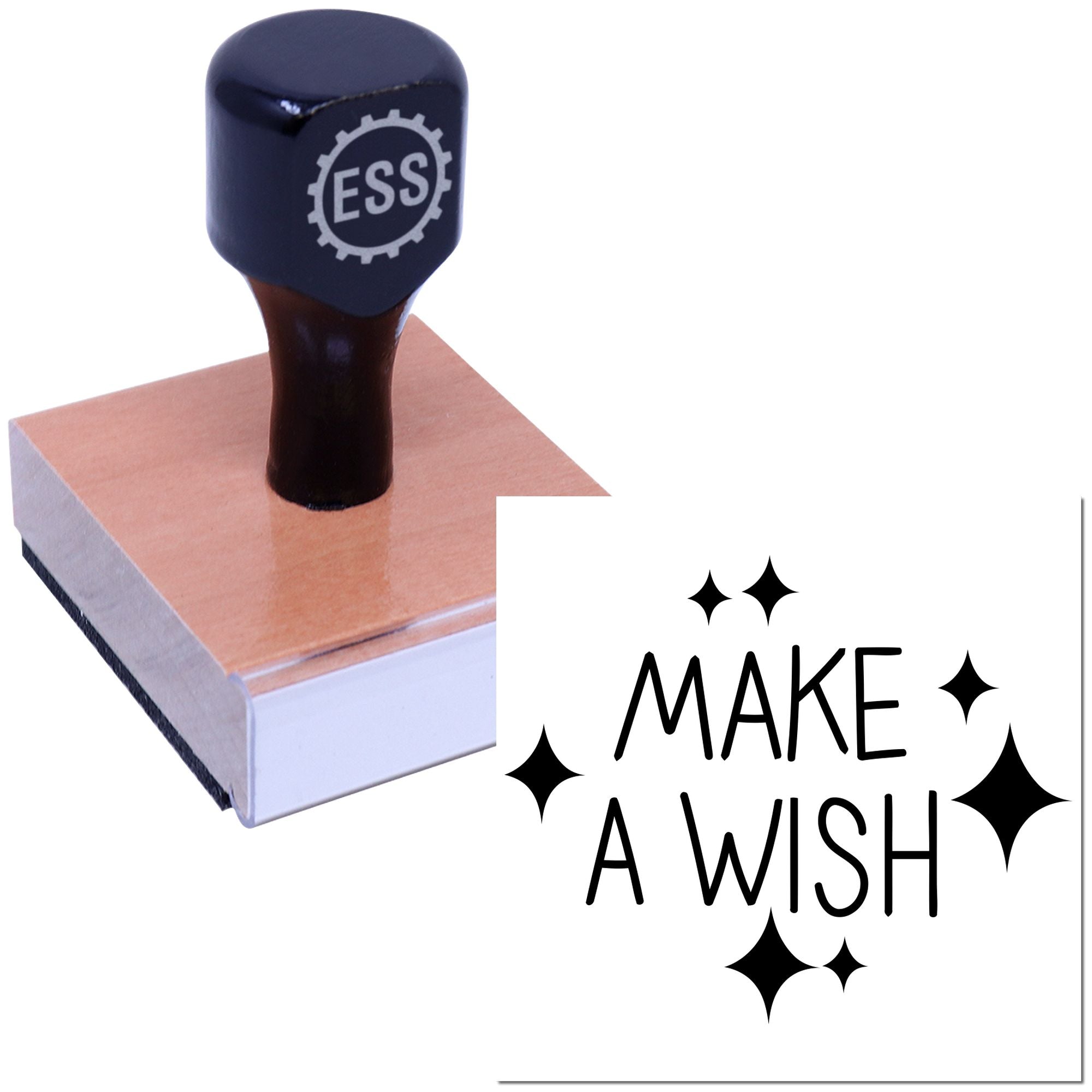 Black ESS rubber stamp on a wooden seal block, with pink base and MAKE A WISH text with sparkle icons.