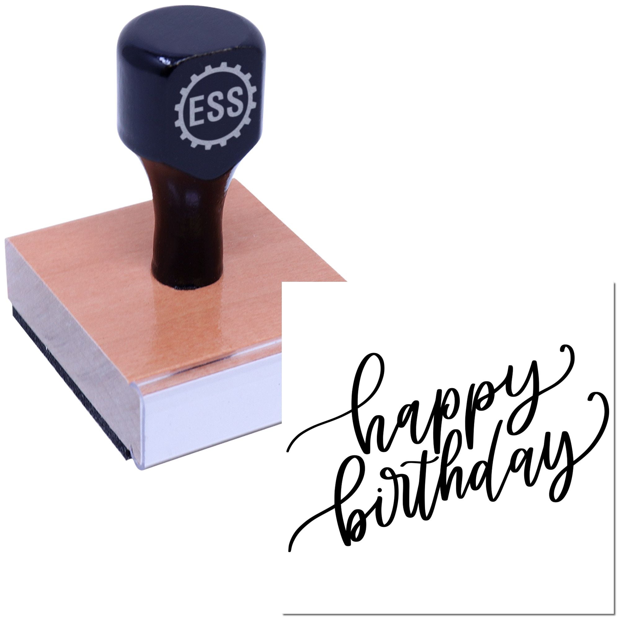 Black ESS rubber stamp on a copper seal block, stamping happy birthday in black script.
