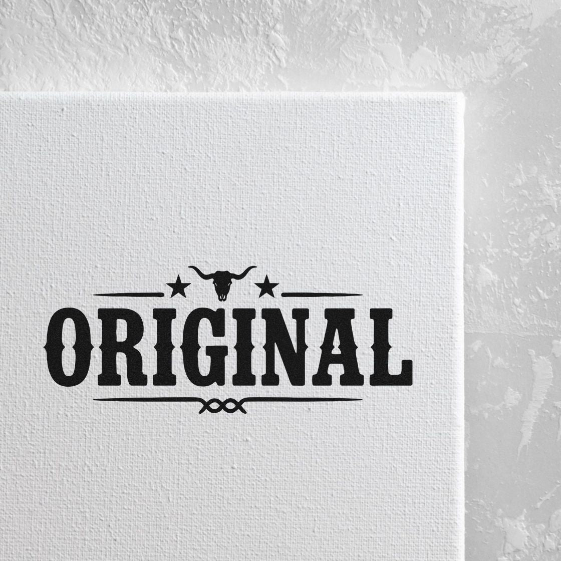 Black ORIGINAL western-style stamp seal with bull skull, stars and decorative lines on white textured canvas