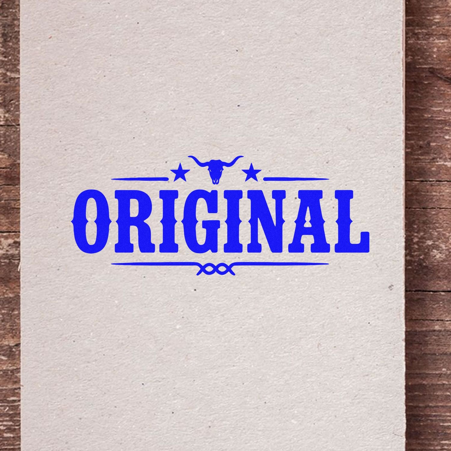 Blue ORIGINAL stamp with longhorn skull and stars on cream paper, a western-style seal for stamp and seal products.