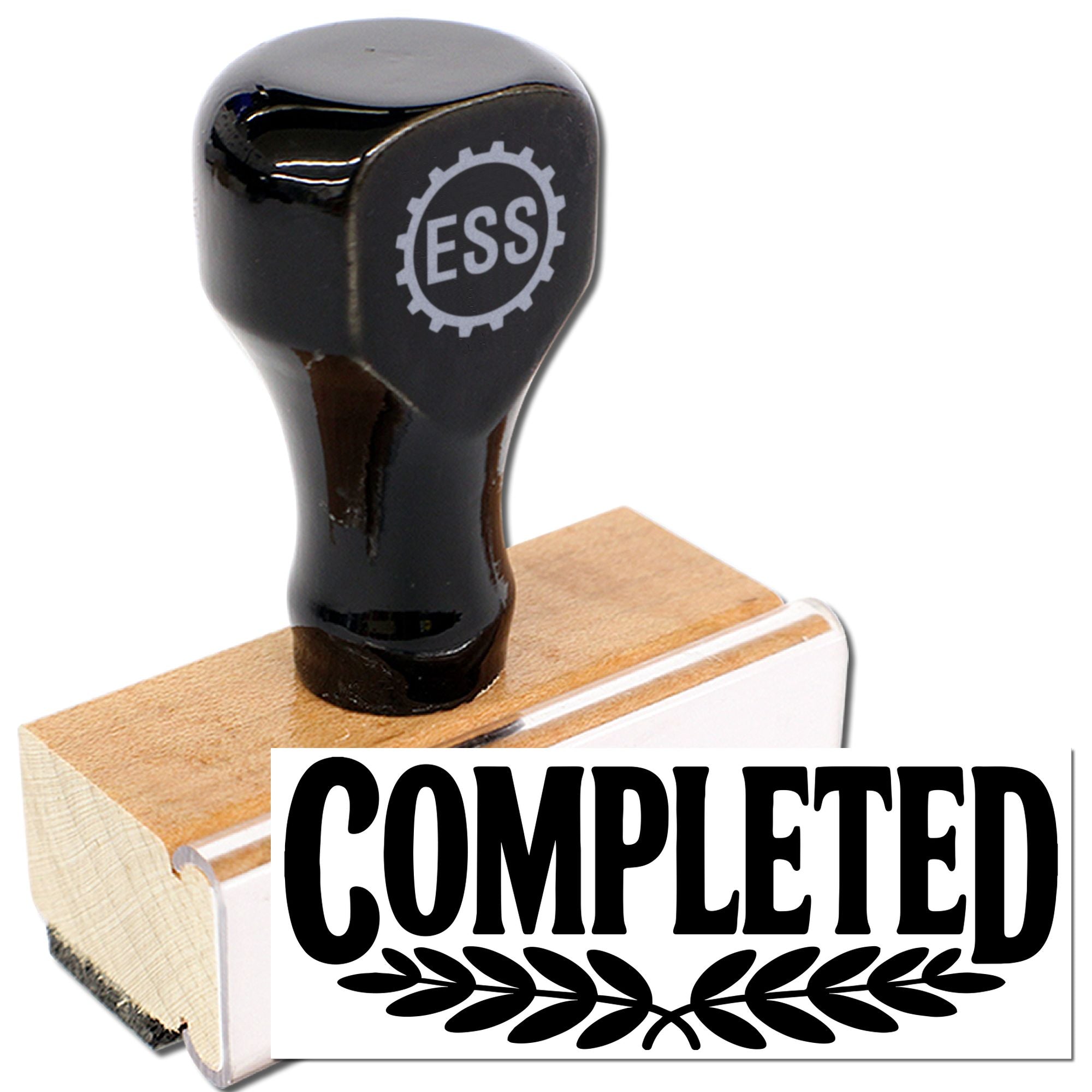 Black wooden rubber stamp and seal with bold COMPLETED text and laurel wreath in black on white background.