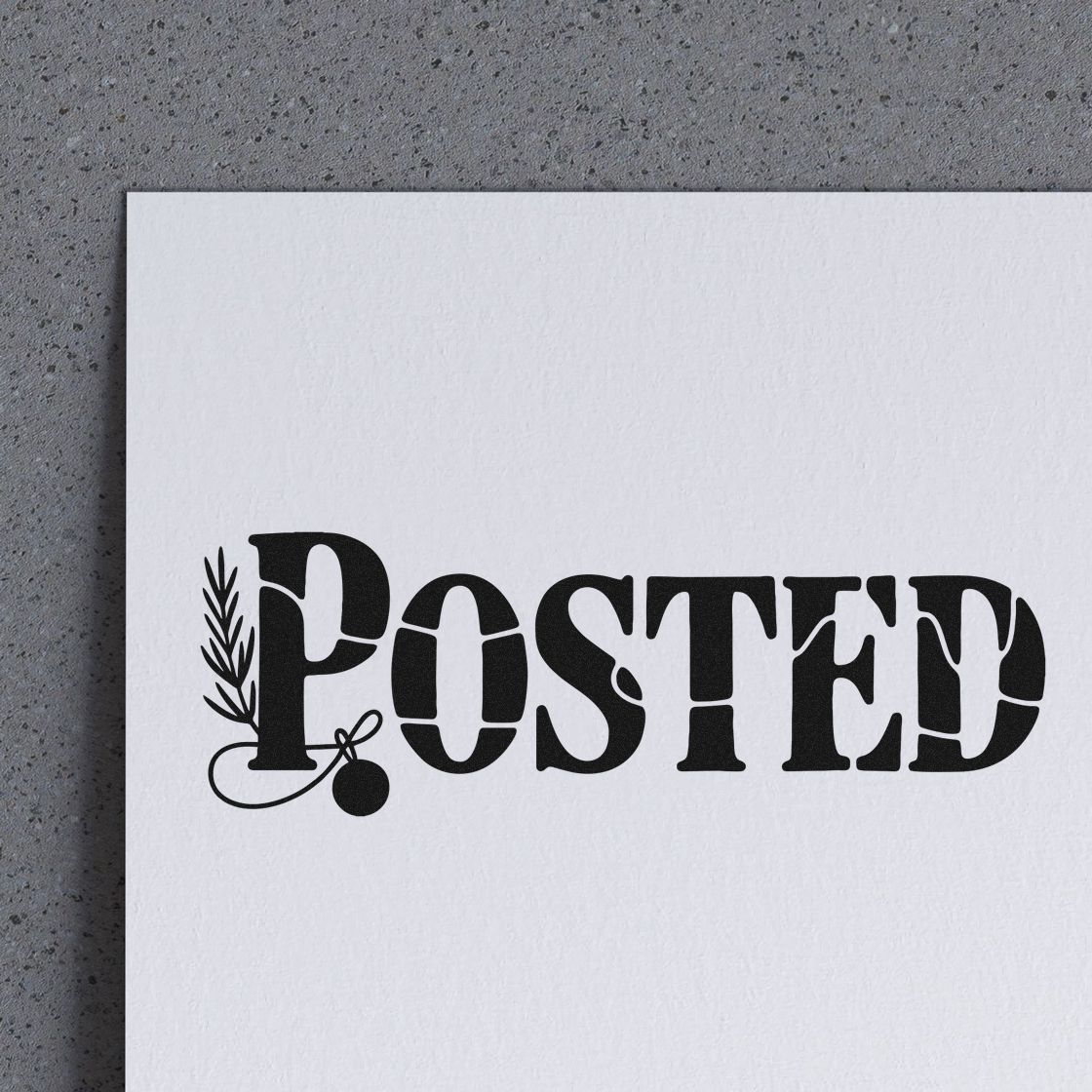 Black POSTED stamp with leafy seal accent on white paper, bold vintage mailing design.