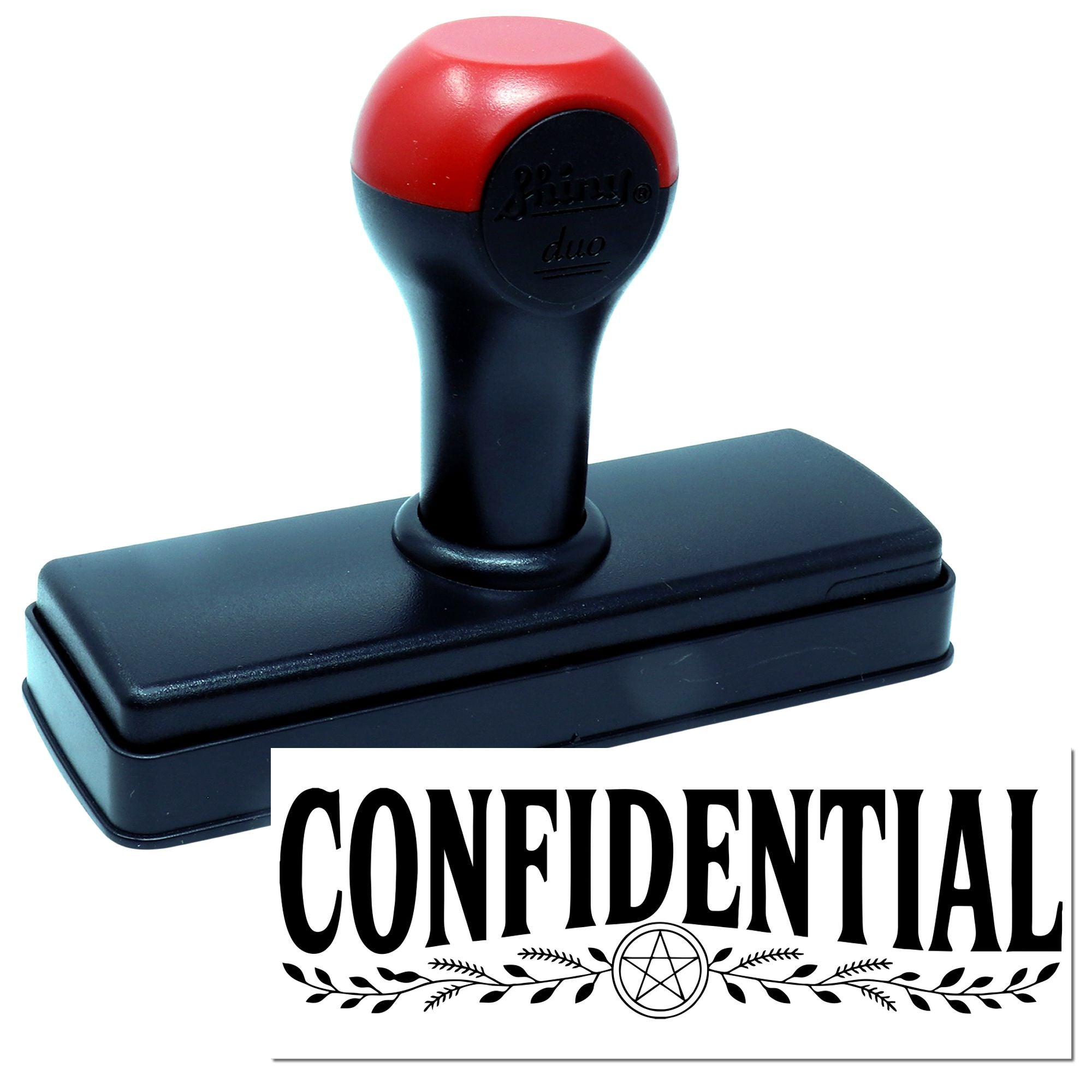 Red and black self-inking confidentiality stamp with rectangular base and bold CONFIDENTIAL seal imprint.