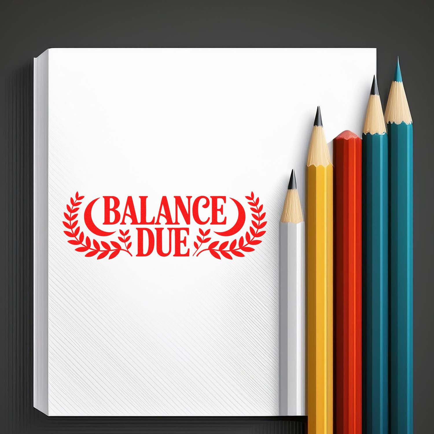 Red BALANCE DUE stamp and seal on white paper, beside yellow, red, teal, and blue pencils