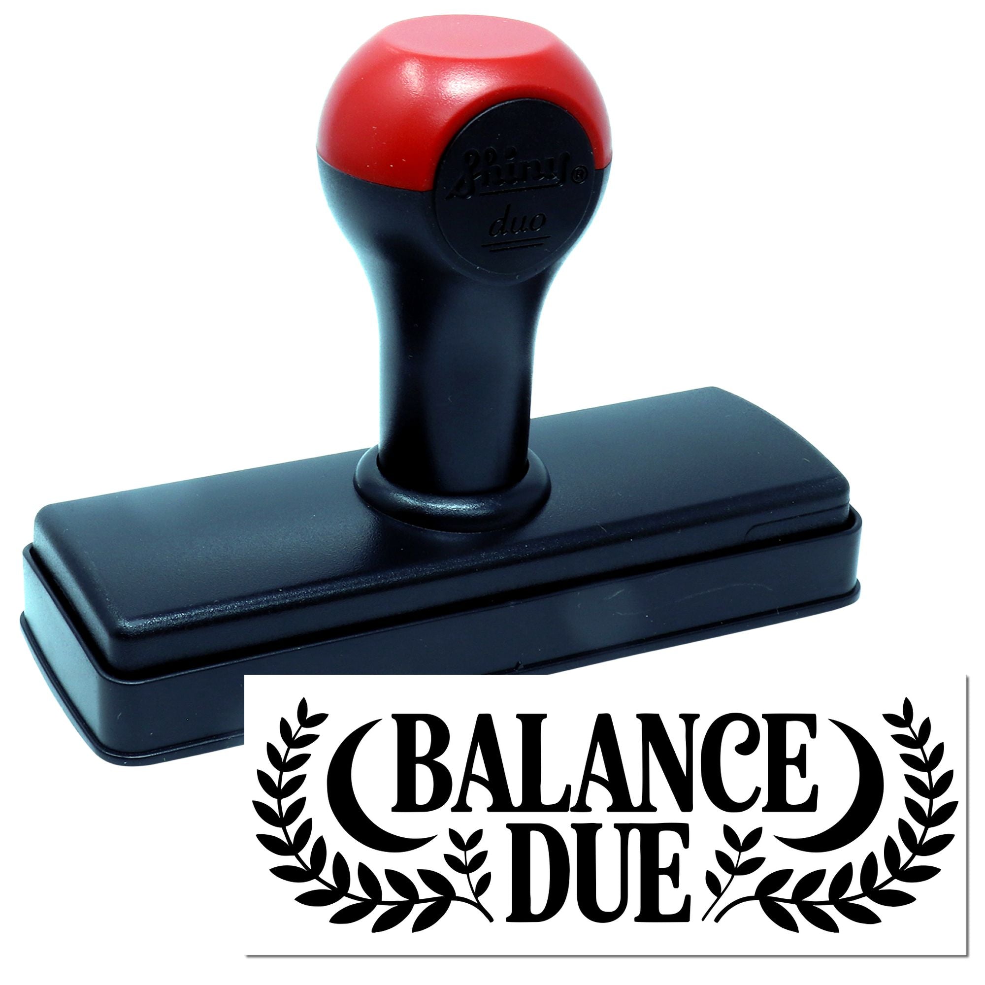 Red and black self-inking stamp and seal with black base, showing a bold black Balance Due imprint with laurel leaves.