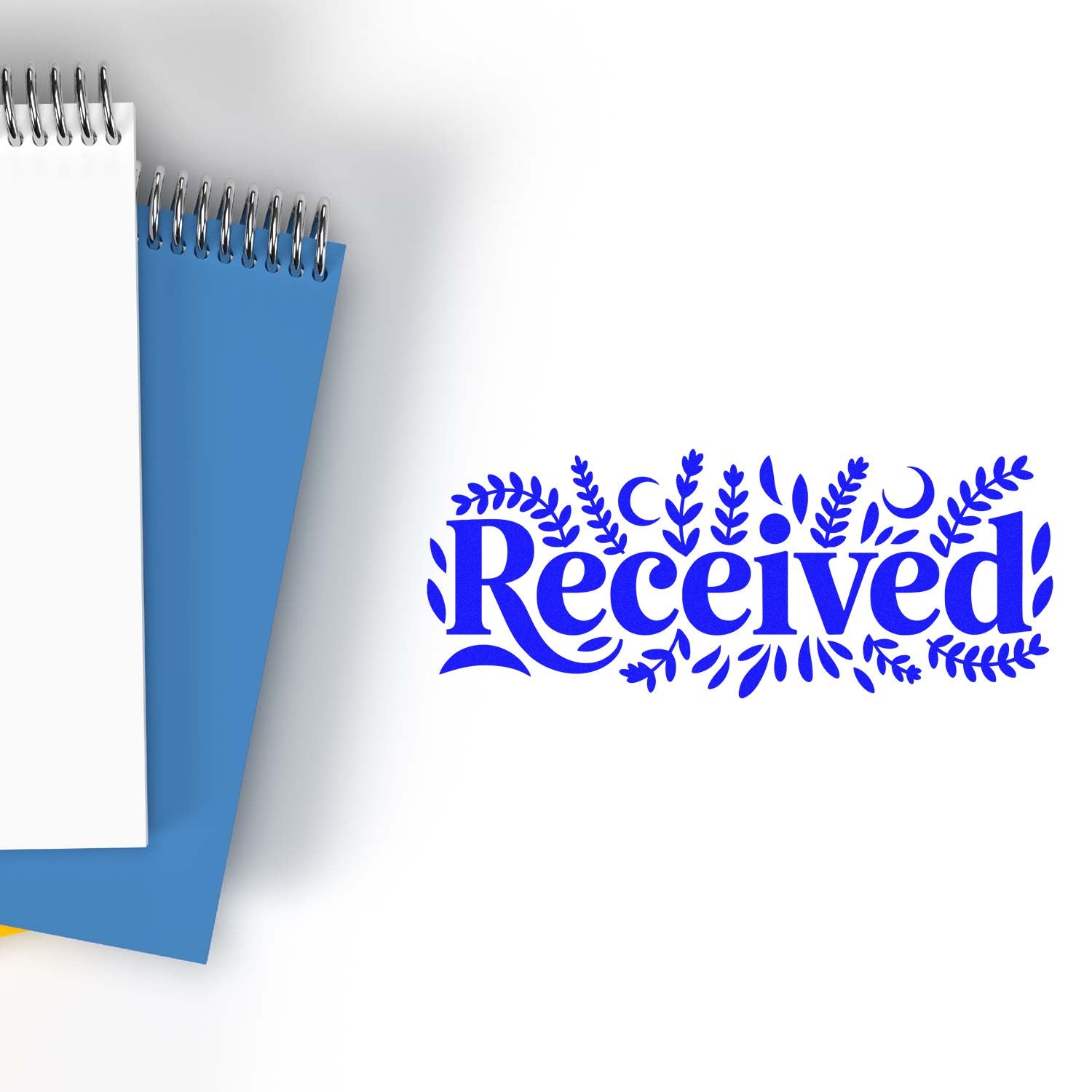 Blue decorative Received stamp and seal design beside spiral notebooks on a white background.