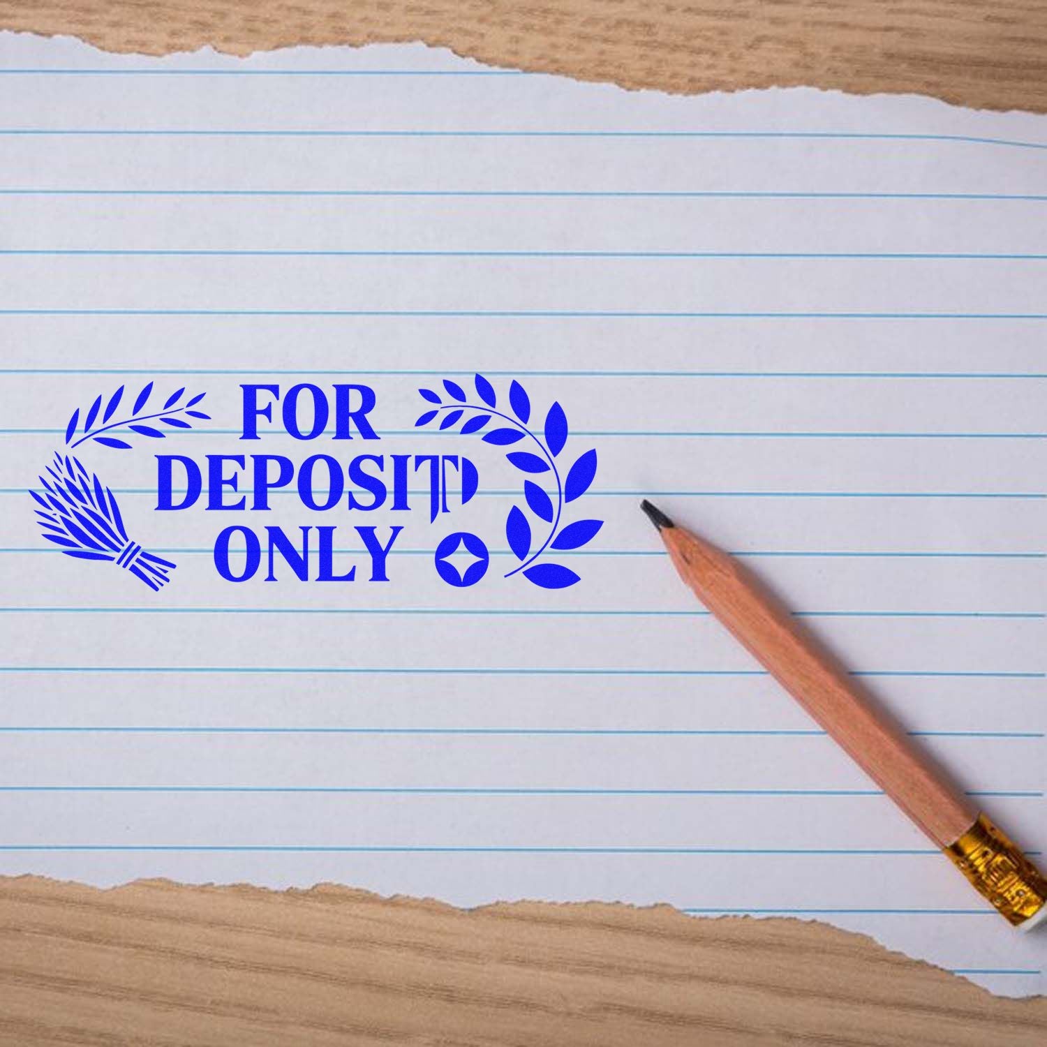 Blue FOR DEPOSIT ONLY bank stamp seal on lined paper with pencil, shown on white notebook sheet.