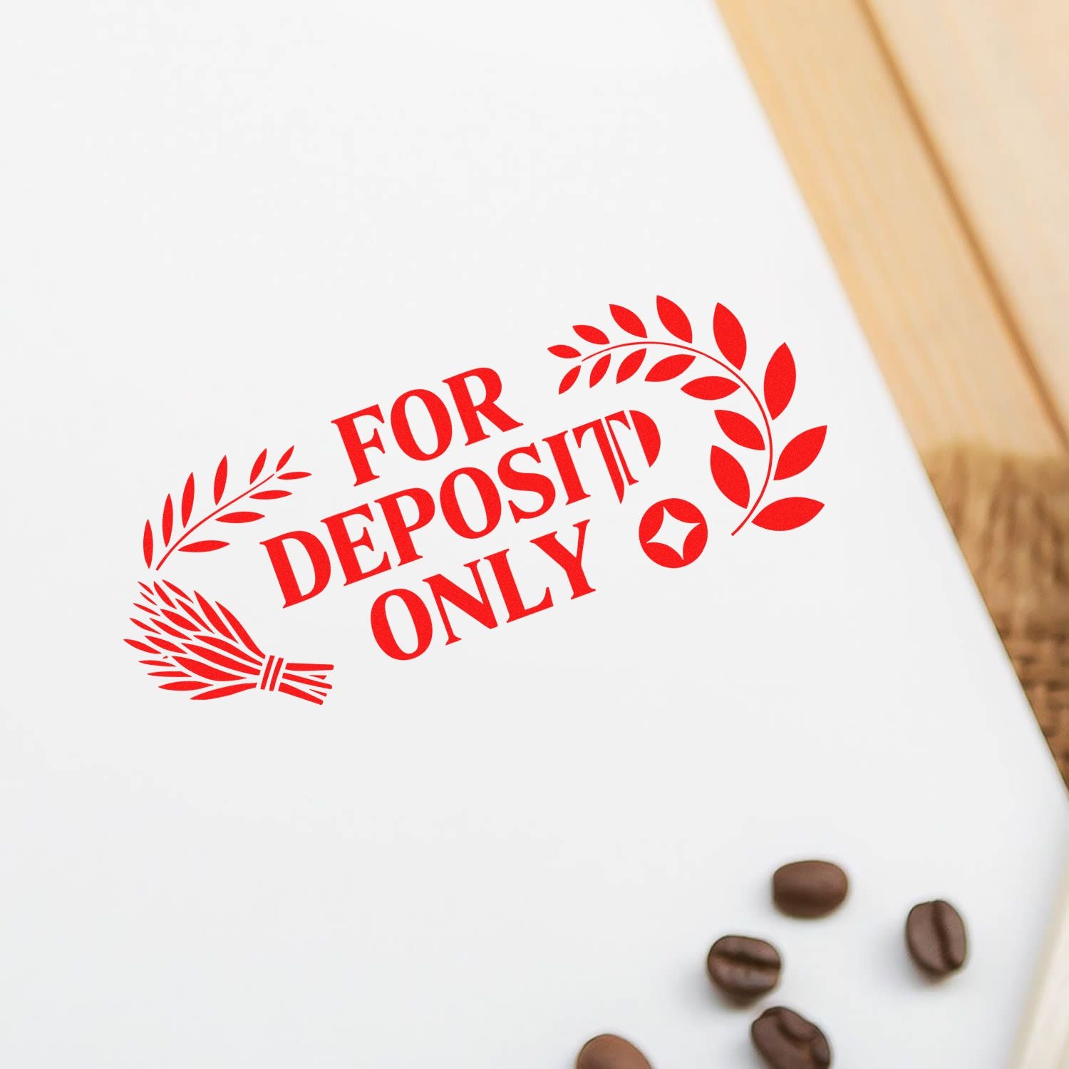 Red FOR DEPOSIT ONLY stamp seal on white paper with leaf wreath, coffee beans, and wood edge.