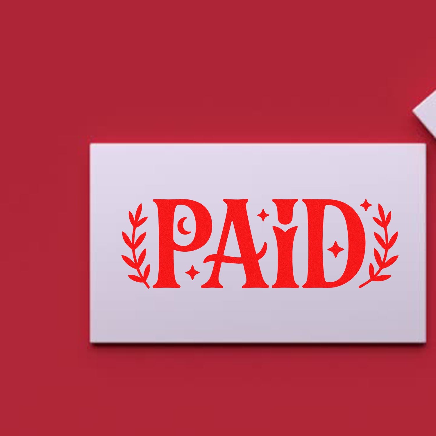 Red PAID stamp seal with laurel leaves and stars on a white card against a deep red background.