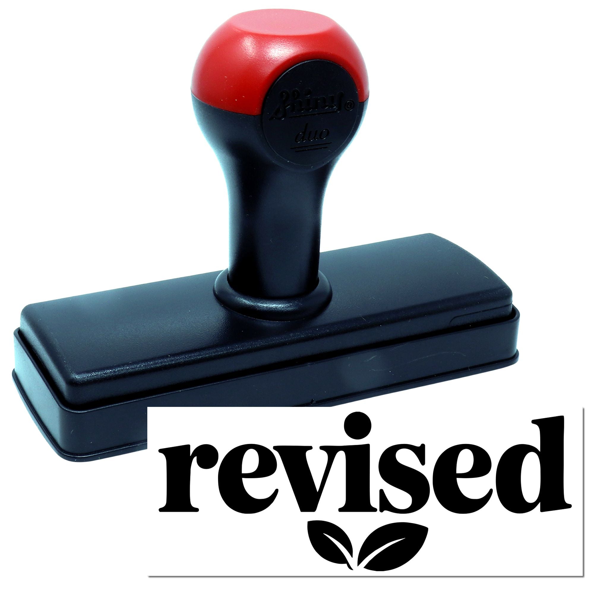 Red and black self-inking stamp with rectangular base, showing a bold black revised seal on white background.