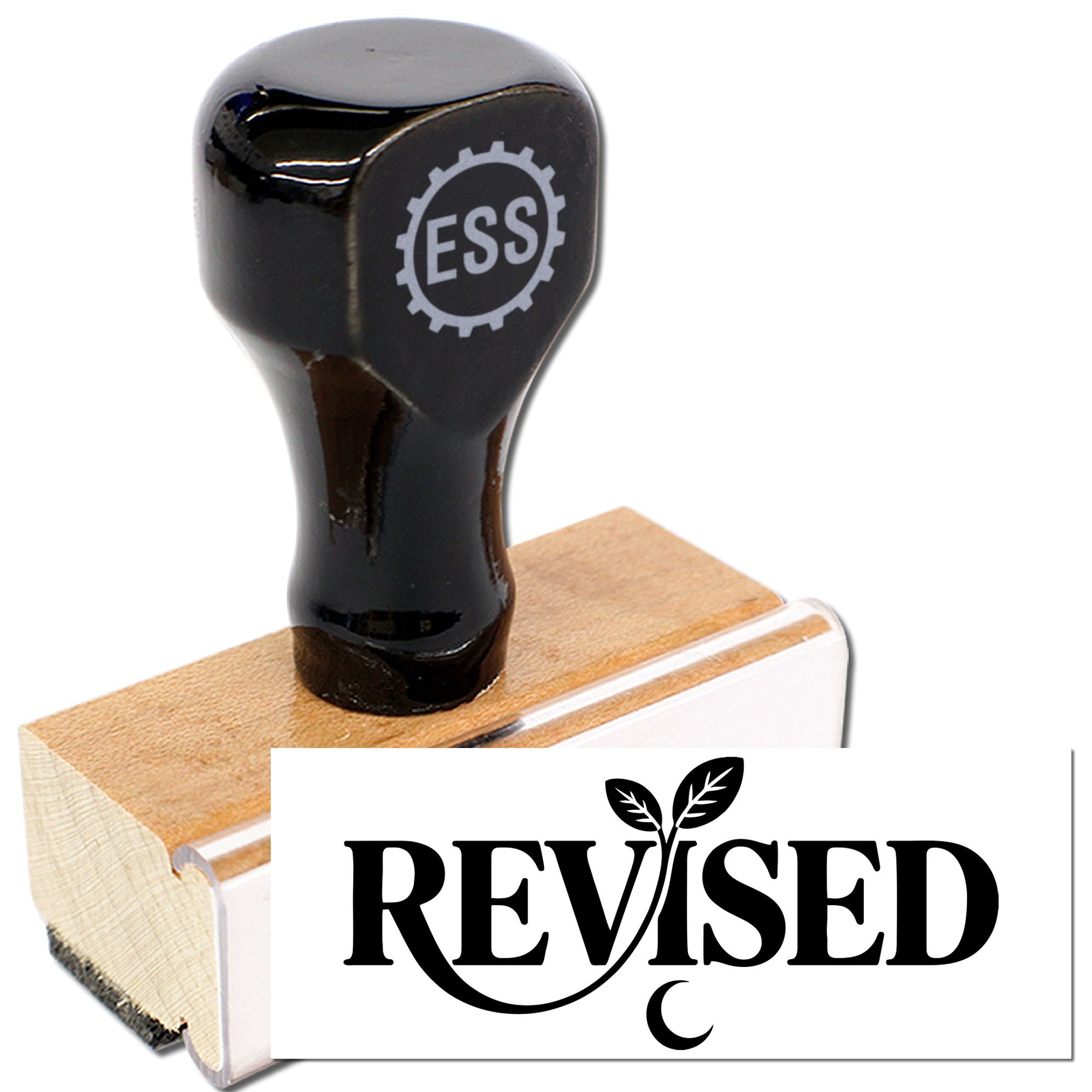 Black rubber seal stamp with tan wooden base, clear acrylic edge, and bold REVISED imprint.