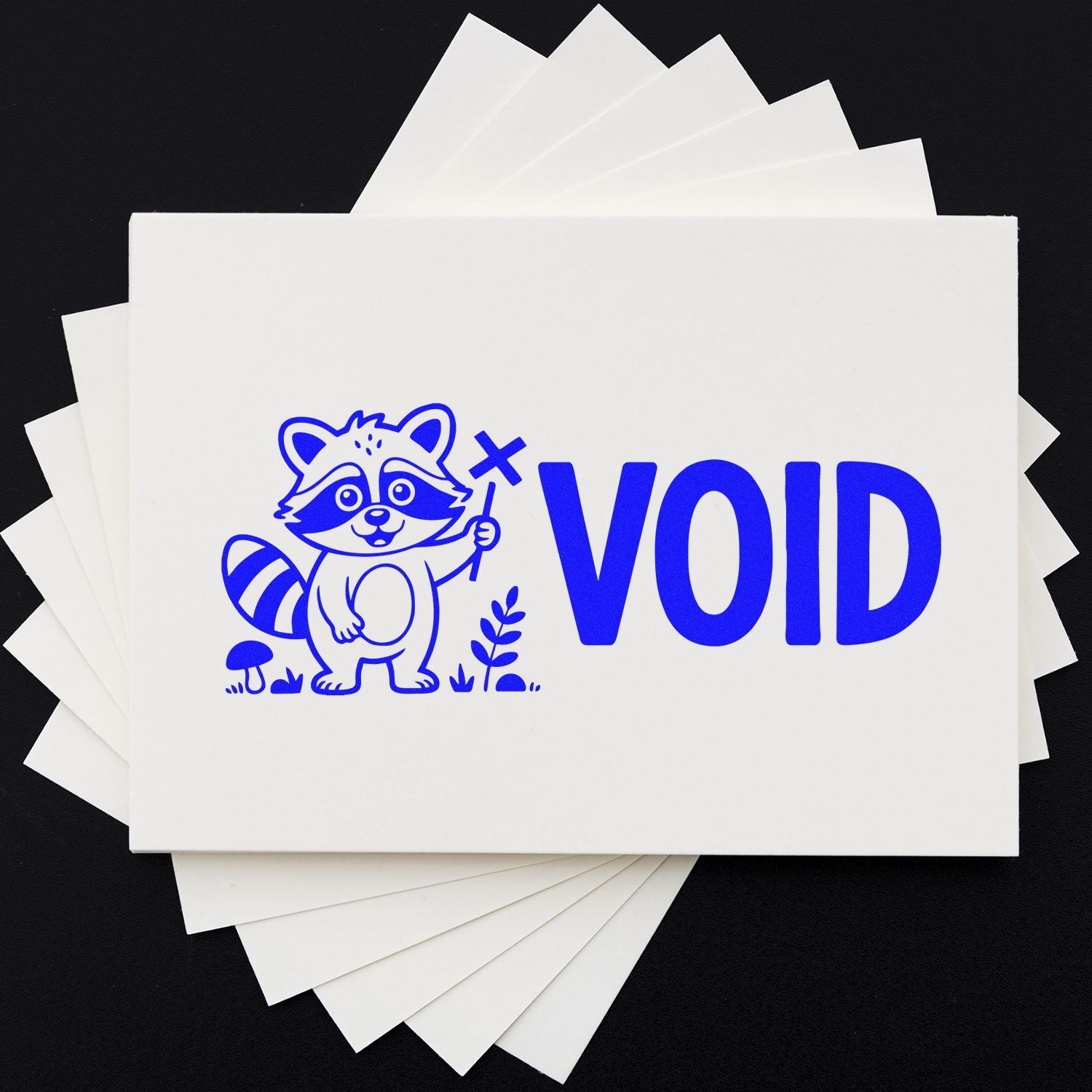 Blue VOID stamp and seal sheets with raccoon mascot on white cards against a black background