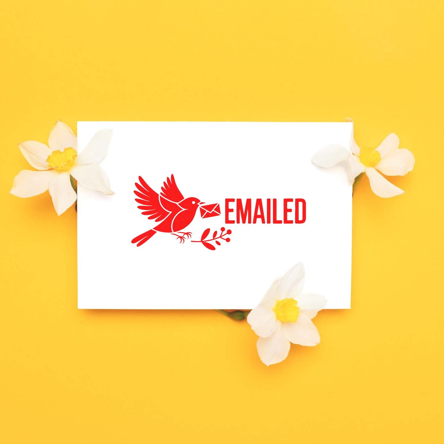 Red emailed rubber stamp and seal with bird carrying an envelope on a white card, on a yellow background with white flowers.
