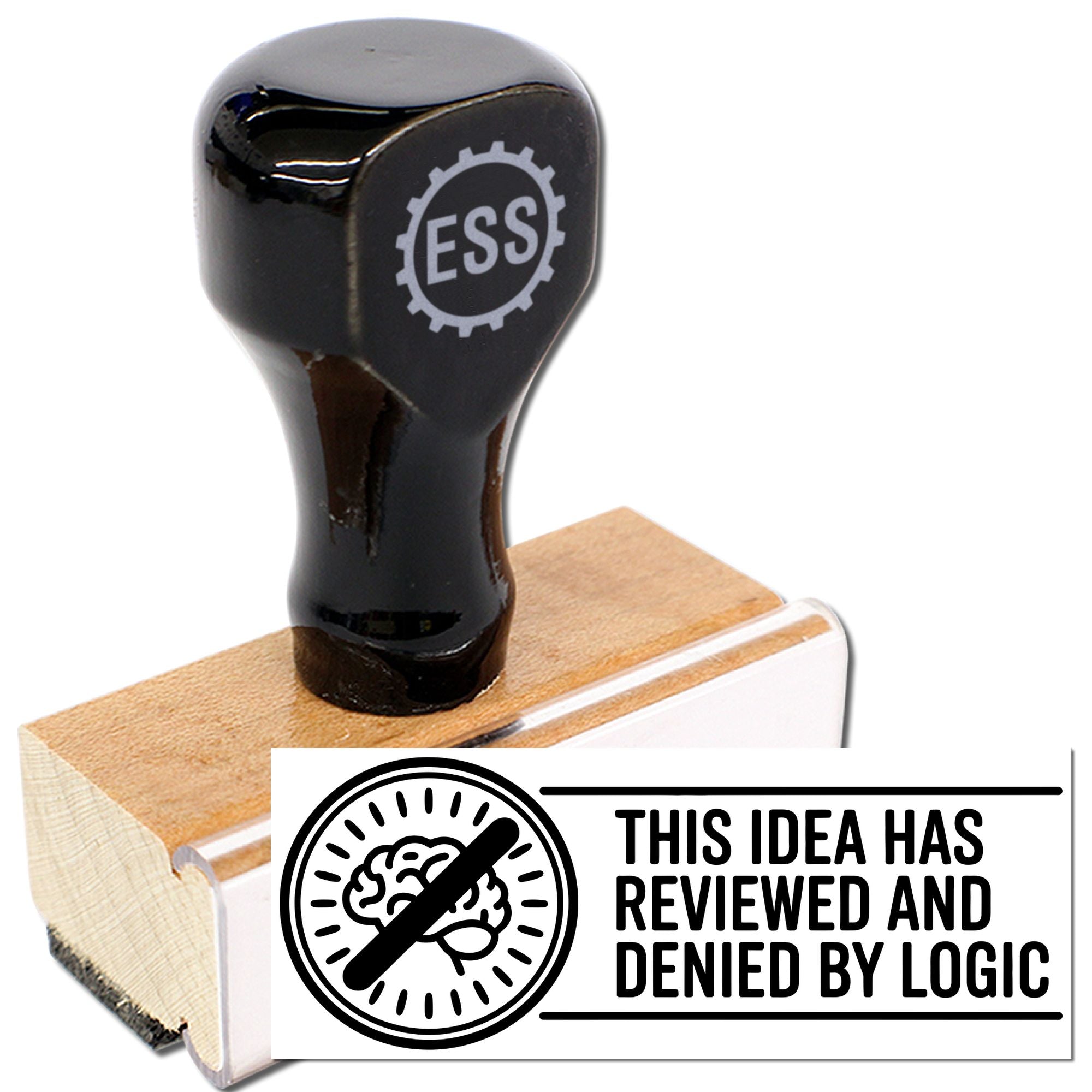 Black ESS rubber stamp on wood base with seal reading "This idea has reviewed and denied by logic" and crossed-out brain.
