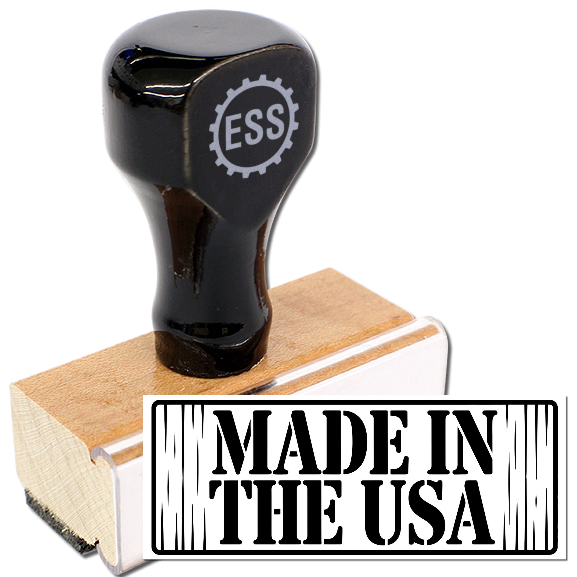 Black ESS rubber stamp and seal with wooden base, printing bold Made in the USA in black and white.
